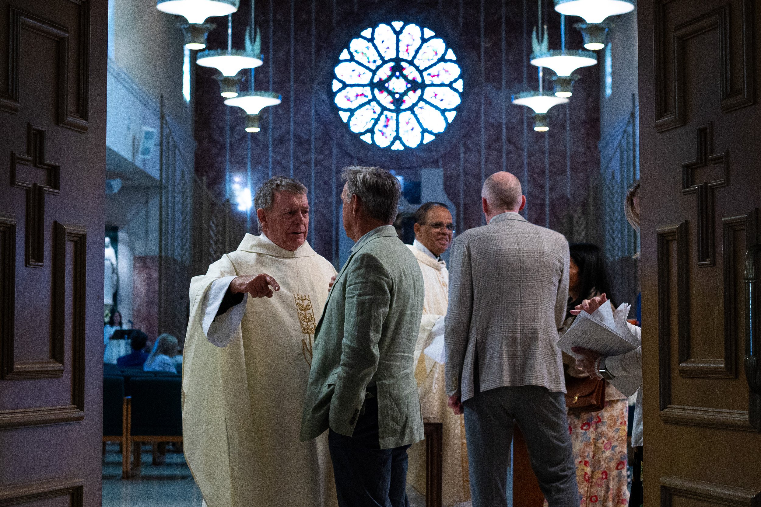  Monsignor Liam Kidney, lead pastor of Corpus Christi Church, greets parishioners following Easter Sunday Mass at St. Joseph’s Chapel in the Carondelet Center on Sunday, April 5, 2026, in Los Angeles, Calif. After the original Corpus Christi Church w