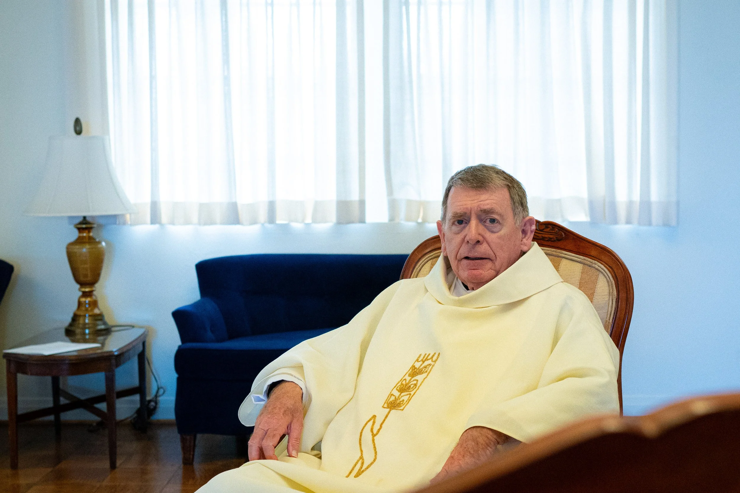  Monsignor Liam Kidney, pastor of Corpus Christi Church, sits for a portrait in the lobby of St. Joseph’s Chapel in the Carondelet Center following Easter Sunday Mass, Sunday, April 5, 2026, in Los Angeles, Calif. The chapel has served as the congreg