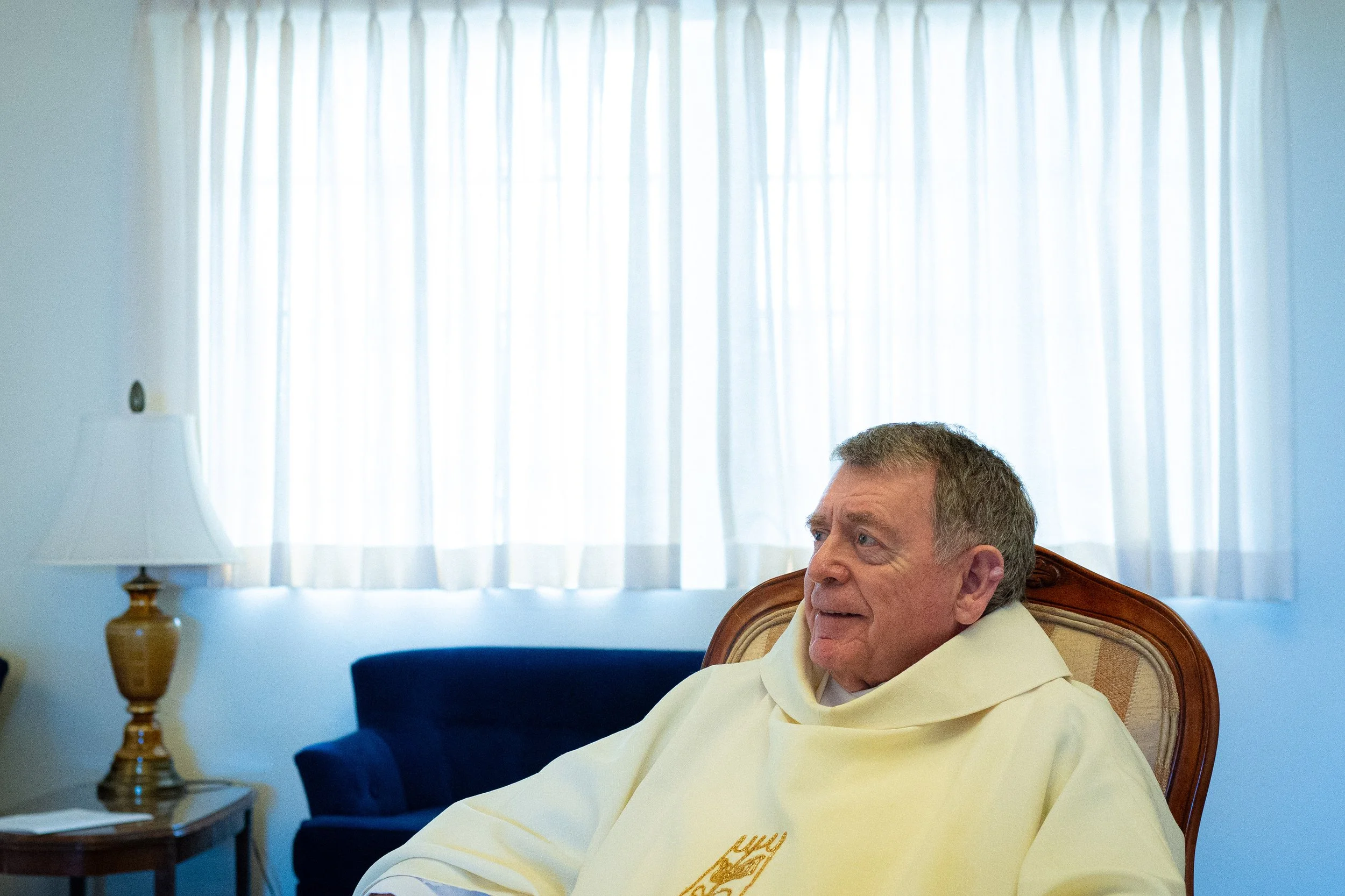  Monsignor Liam Kidney, pastor of Corpus Christi Church, sits for a portrait in the lobby of St. Joseph’s Chapel in the Carondelet Center following Easter Sunday Mass, Sunday, April 5, 2026, in Los Angeles, Calif. The chapel has served as the congreg