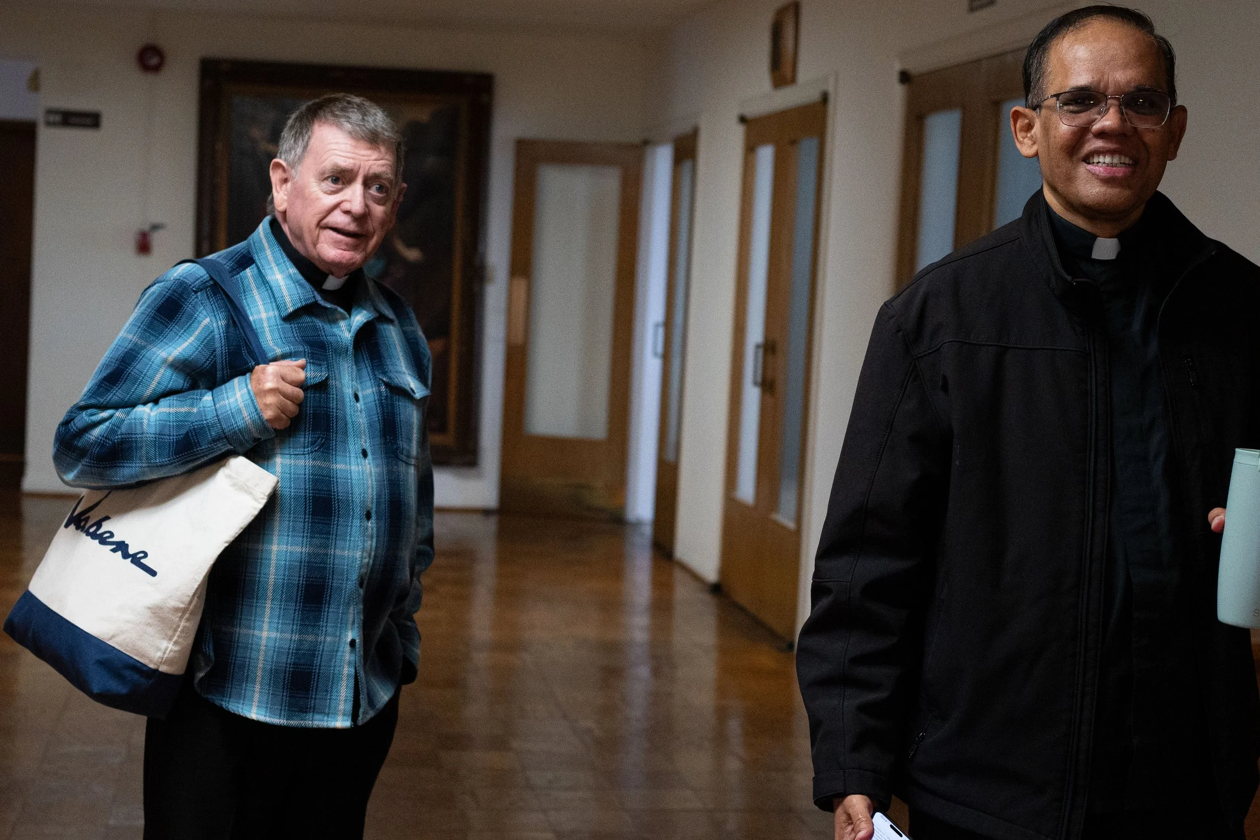 Monsignor Liam Kidney and Father Valerian stand in the lobby of St. Joseph’s Chapel at the Carondelet Center following their Easter Sunday Mass, Sunday, April 5, 2026, in Los Angeles, Calif. The chapel has served as the congregation’s temporary home