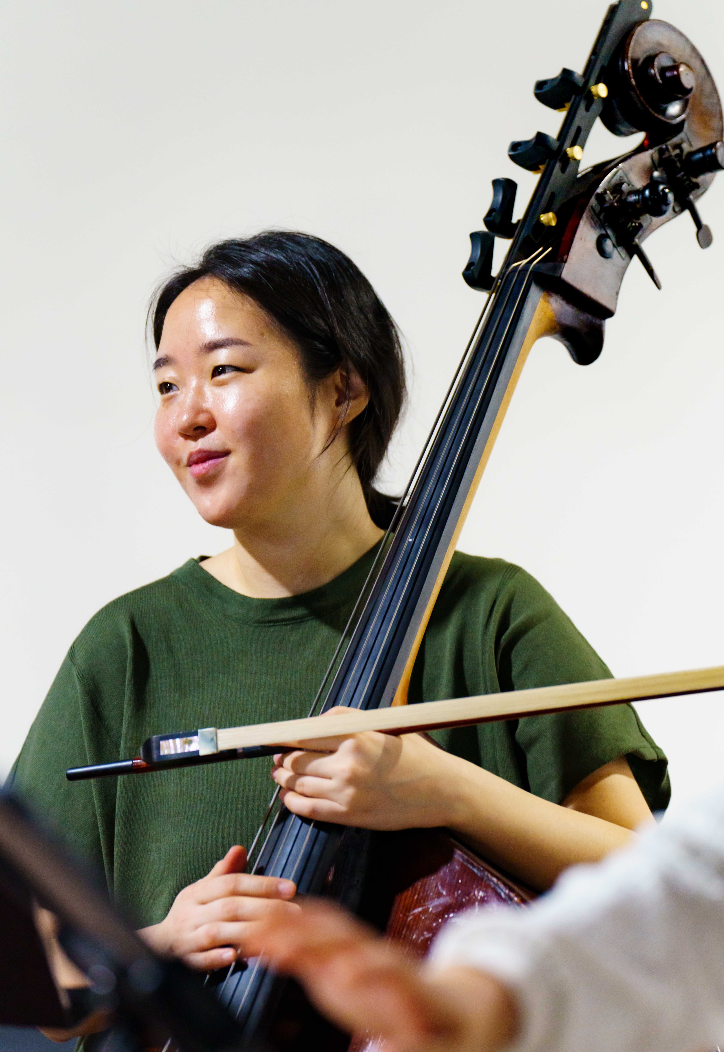  Bassist SooKyung Chun during rehearsal at Global Arts in Los Angeles, Friday, March 27, 2026. Chun originally moved from Korea to California to study with Los Angeles Philharmonic bassist David Allen Moore after obtaining her degree from Seoul Natio