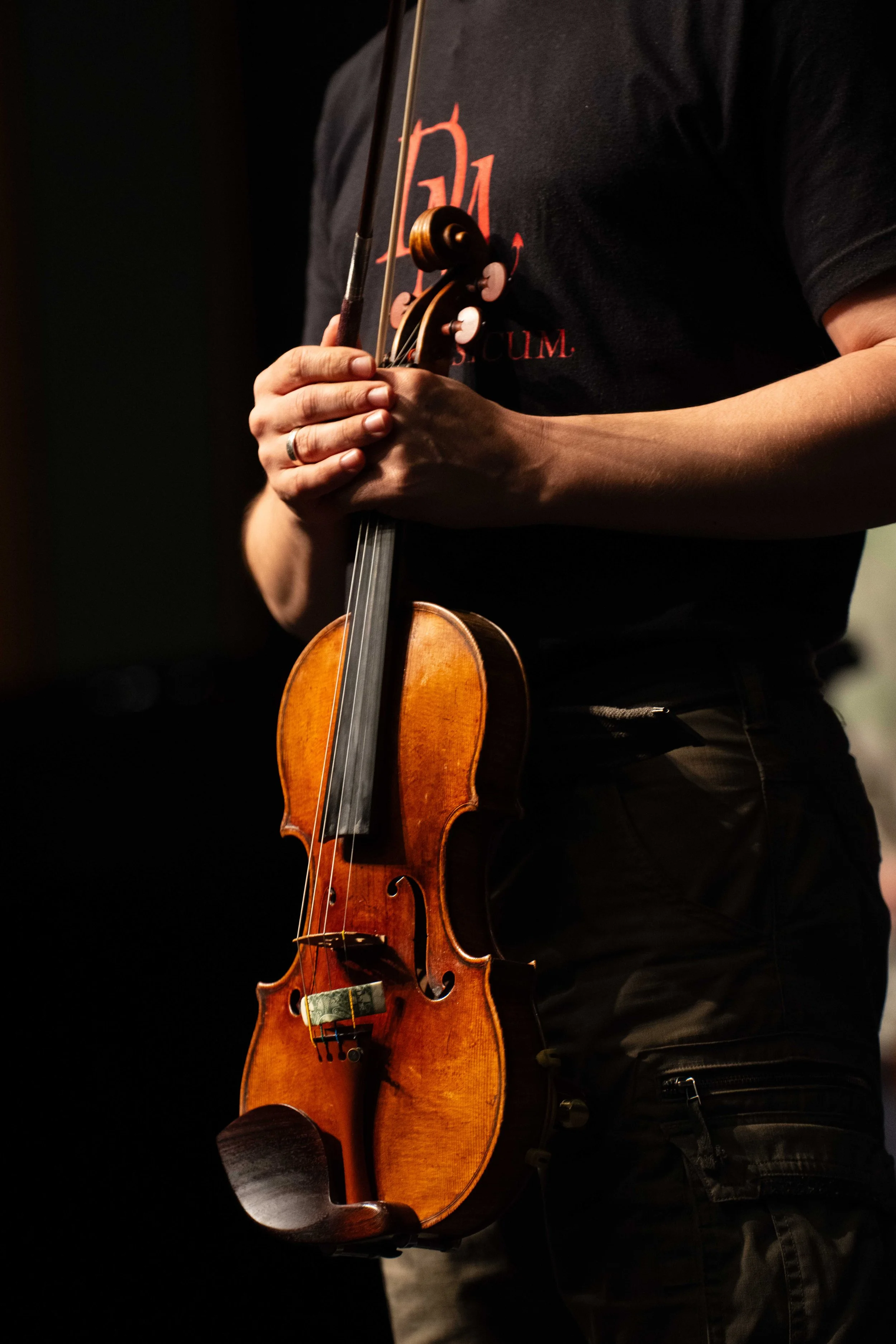  Delirium Musicum (DM) founder Etienne Gara at Theatre Raymond Kabbaz in Los Angeles, Wednesday, March 25, 2026, addresses young visiting students of Le Lycée Français de Los Angeles from the stage before rehearsing. (Elizabeth Bacher | The Corsair) 