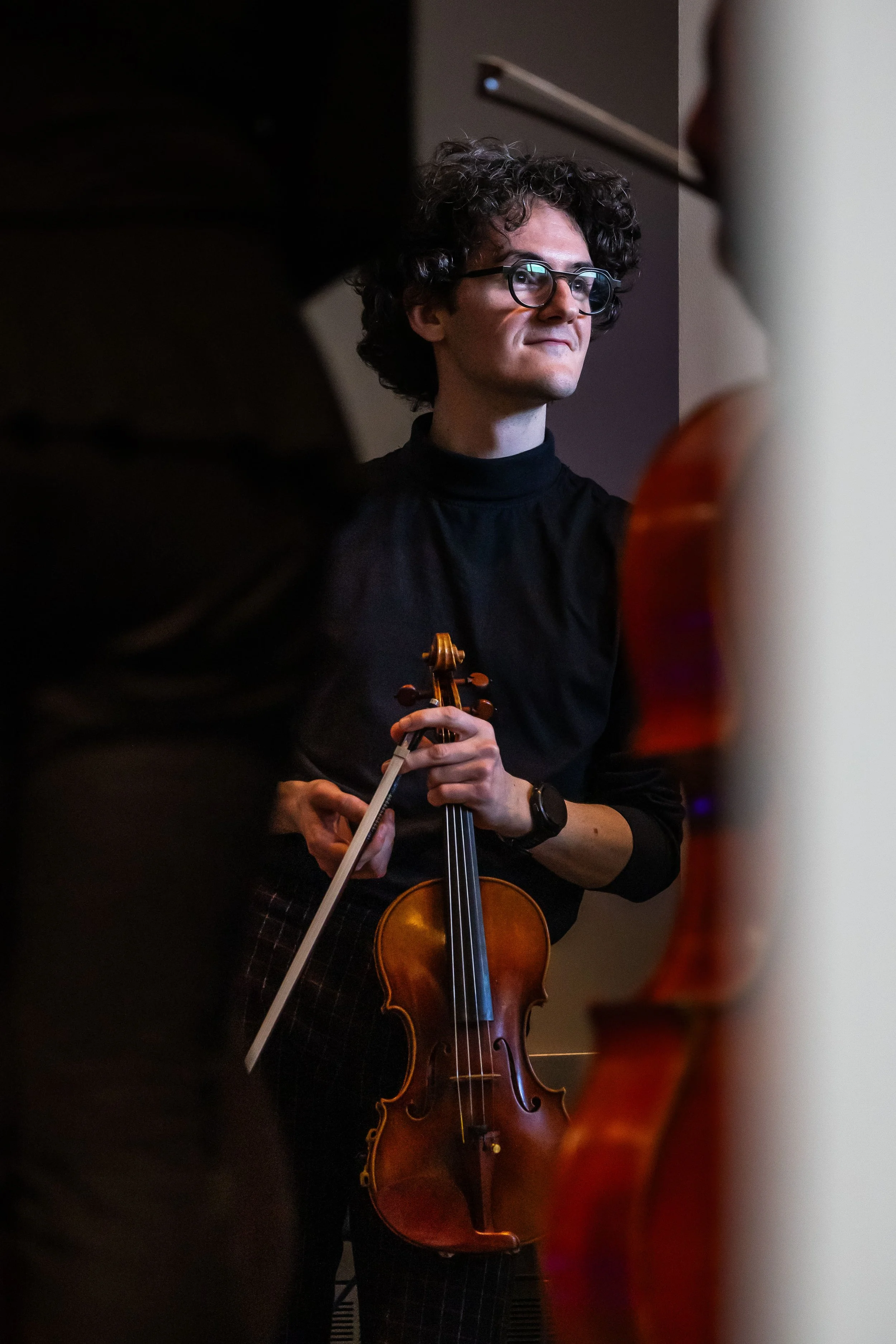  Seattle-based violinist Evan Hjort at BroadStage in Santa Monica, Calif., just before performing with Delirium Musicum (DM) on Sunday, March 29, 2026. Hjort first began to work with DM in January 2022. He had suffered a nerve injury while at New Eng