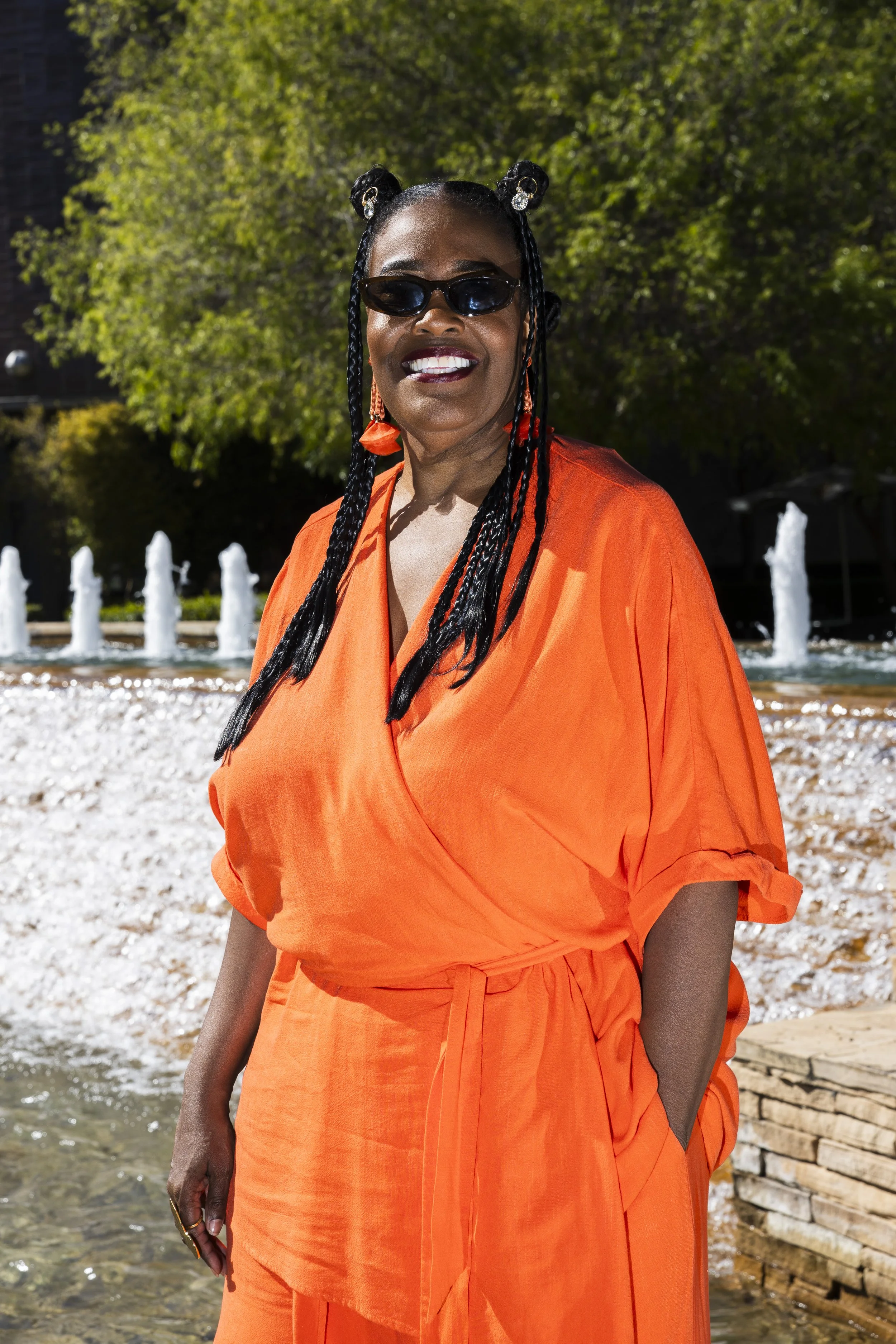  Wendi DeMorst poses in front of a water fountain at Santa Monica College on Sunday, March 1, 2026, months before she retires. (Kayjel J. Mairena | The Corsair) 