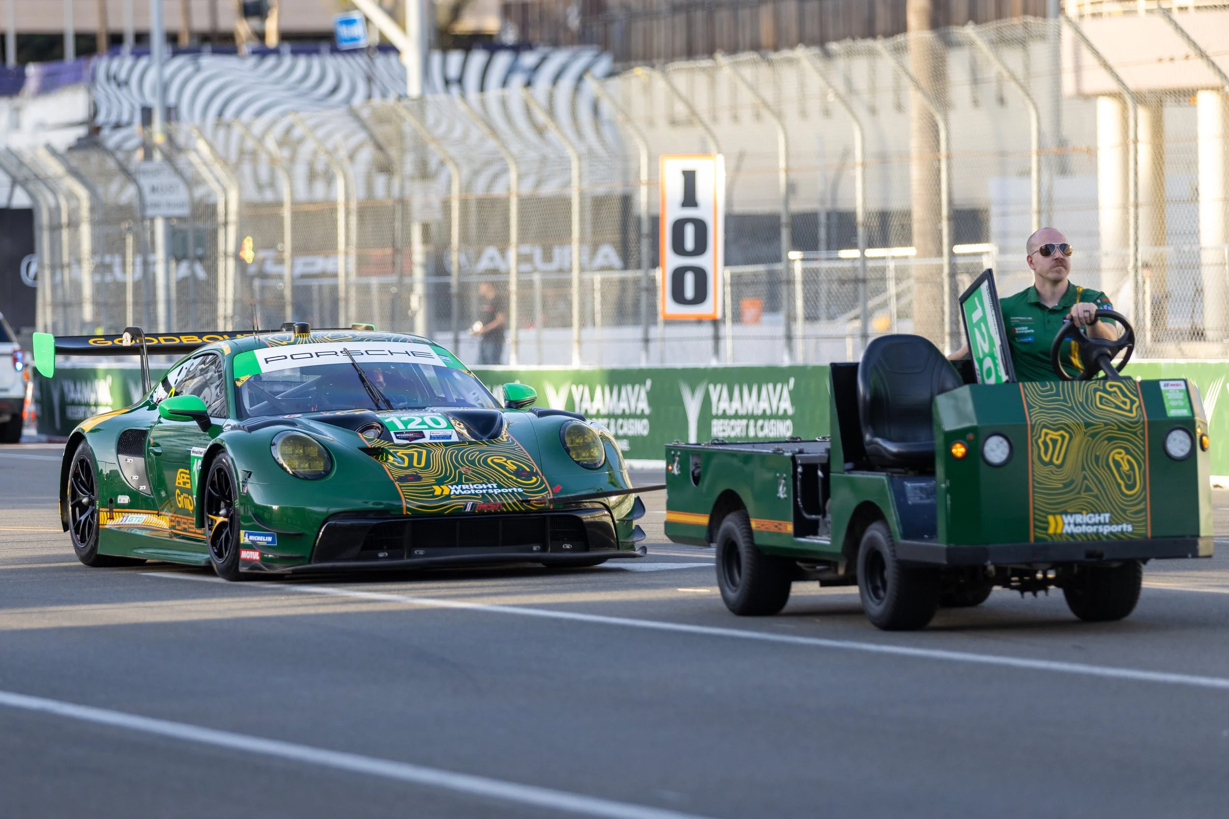  Grand Touring Daytona (GTD) Wright Motorsports Porsche 911 GT3 R (992) Number 120 is being towed towards The Pike Mall to be shown in the Thunder Thursday event before the Acura Grand Prix of Long Beach on Thursday, April 16, 2026. The Acura Grand P