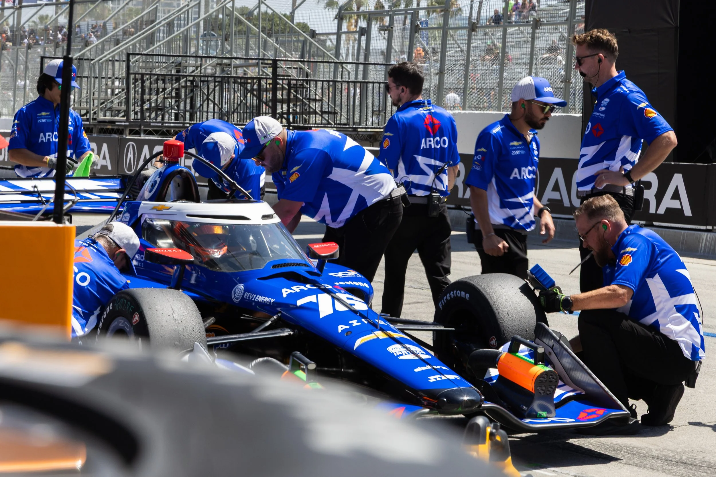  Juncos Hollinger Racing Number 76 driven by Rinus VeeKay (CQ) waits in pit lane during a red flag as his pit crew works on the car and gains data from the car during Practice 2 of the Nippon Telegraph and Telephone Corporation (NTT) IndyCar Series o