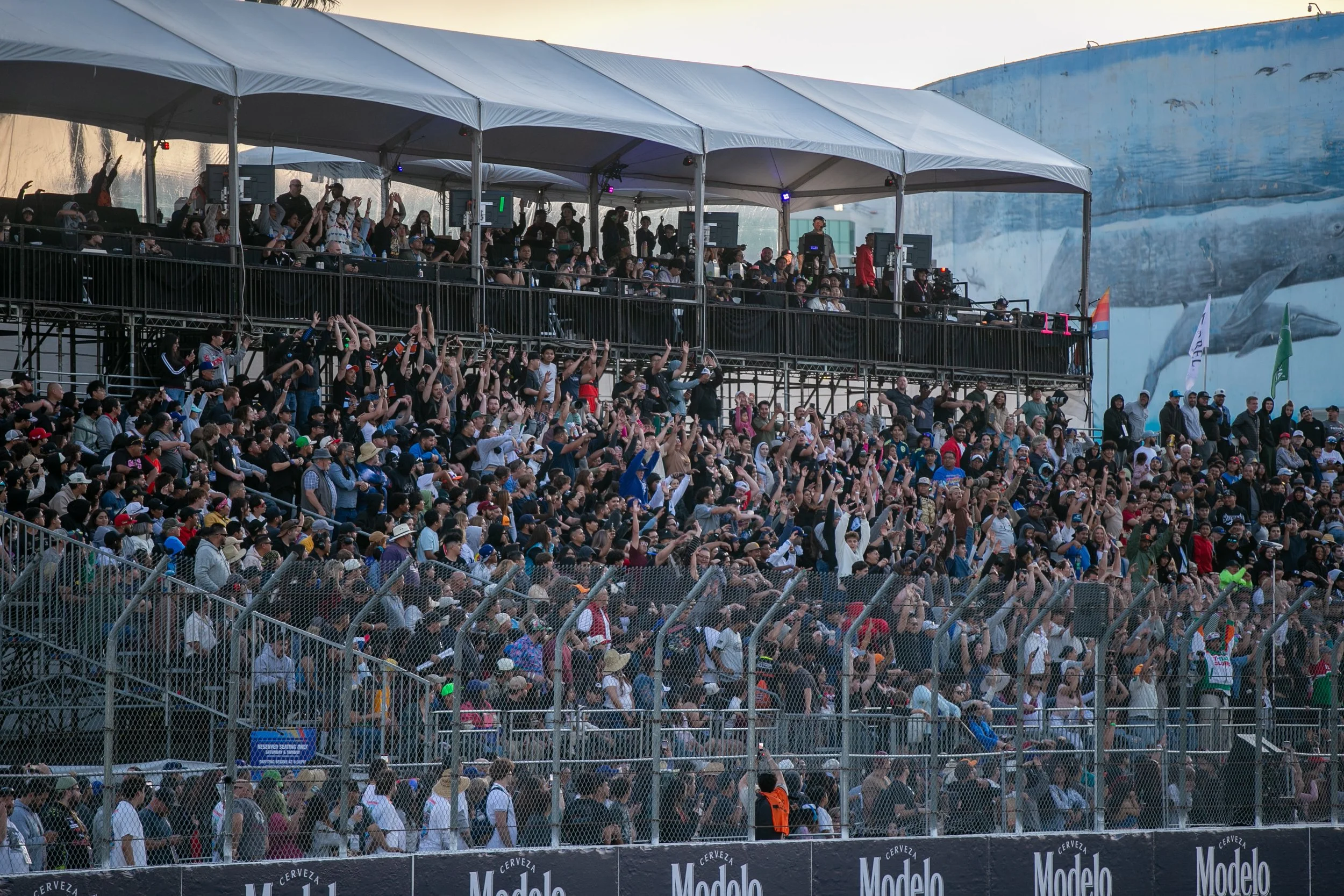  Formula Drift fans are creating a wave during an intermission of the Formula Drift Challenge 1 on Friday, April 17, 2026, on Shoreline Drive, Long Beach, Calif. The reason for the intermission is that people are breaking through security fences duri