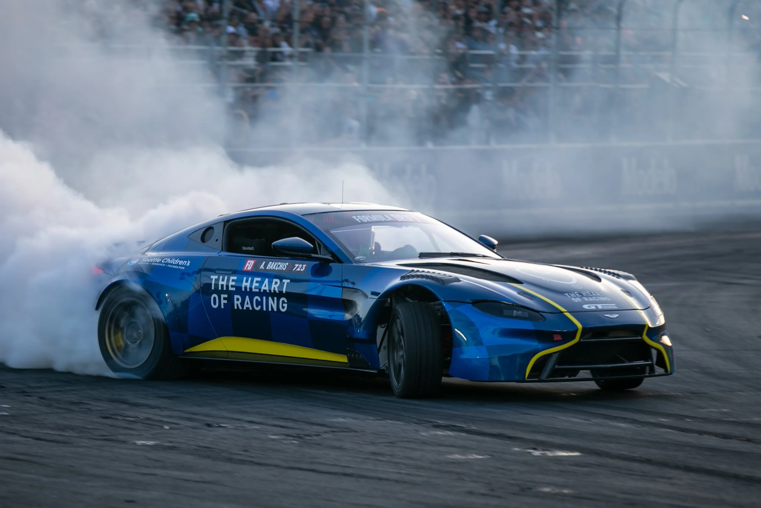  The Heart of Racing Aston Martin Vantage V12, driven by Aurimas (Odi) Bakchis (CQ), slides into turn 11 during the Formula Drift Challenge 1 on Friday, April 17, 2026, on Shoreline Drive, Long Beach, Calif. Odi Bakchis won the first Formula Drift Ch