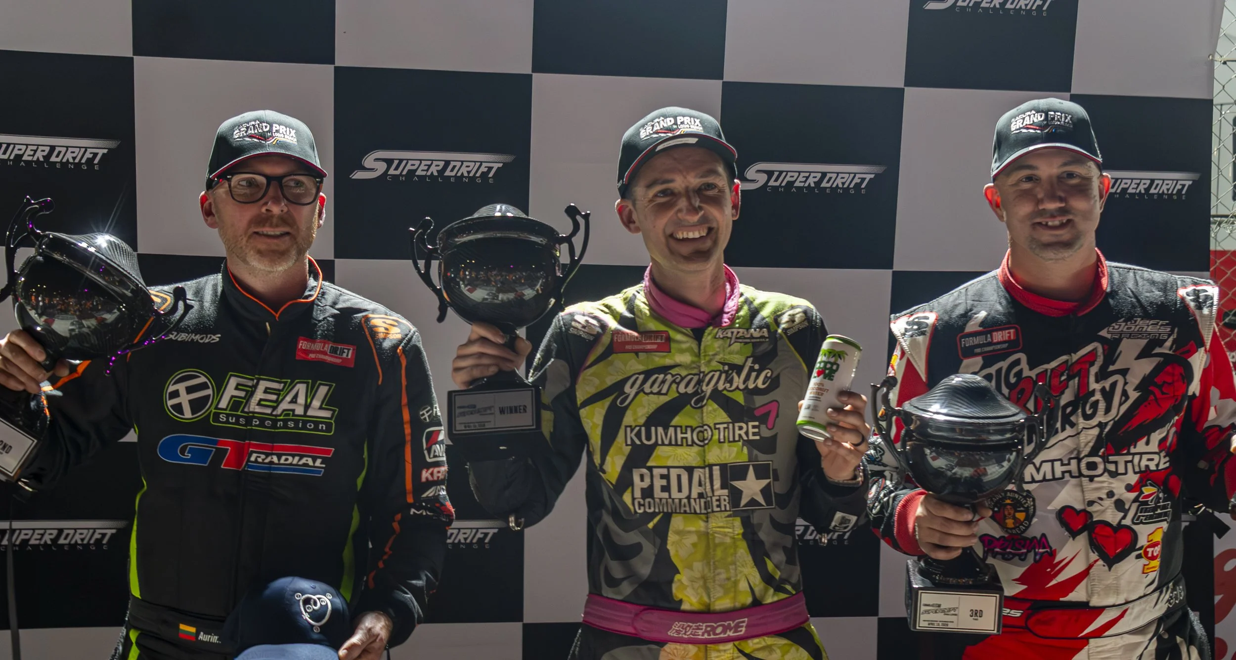  Winners of the 2026 2026 Formula DRIFT Super Drift Challenge at the Long Beach Grand Prix Day 2 (L-R) 2nd place, Aurimas "Odi" Bakchis (The Heart of Racing Aston Martin Vantage V12), 1st place, Rome Charpentier (Kumho Tire USA) &  3rd place, Jeff Jo