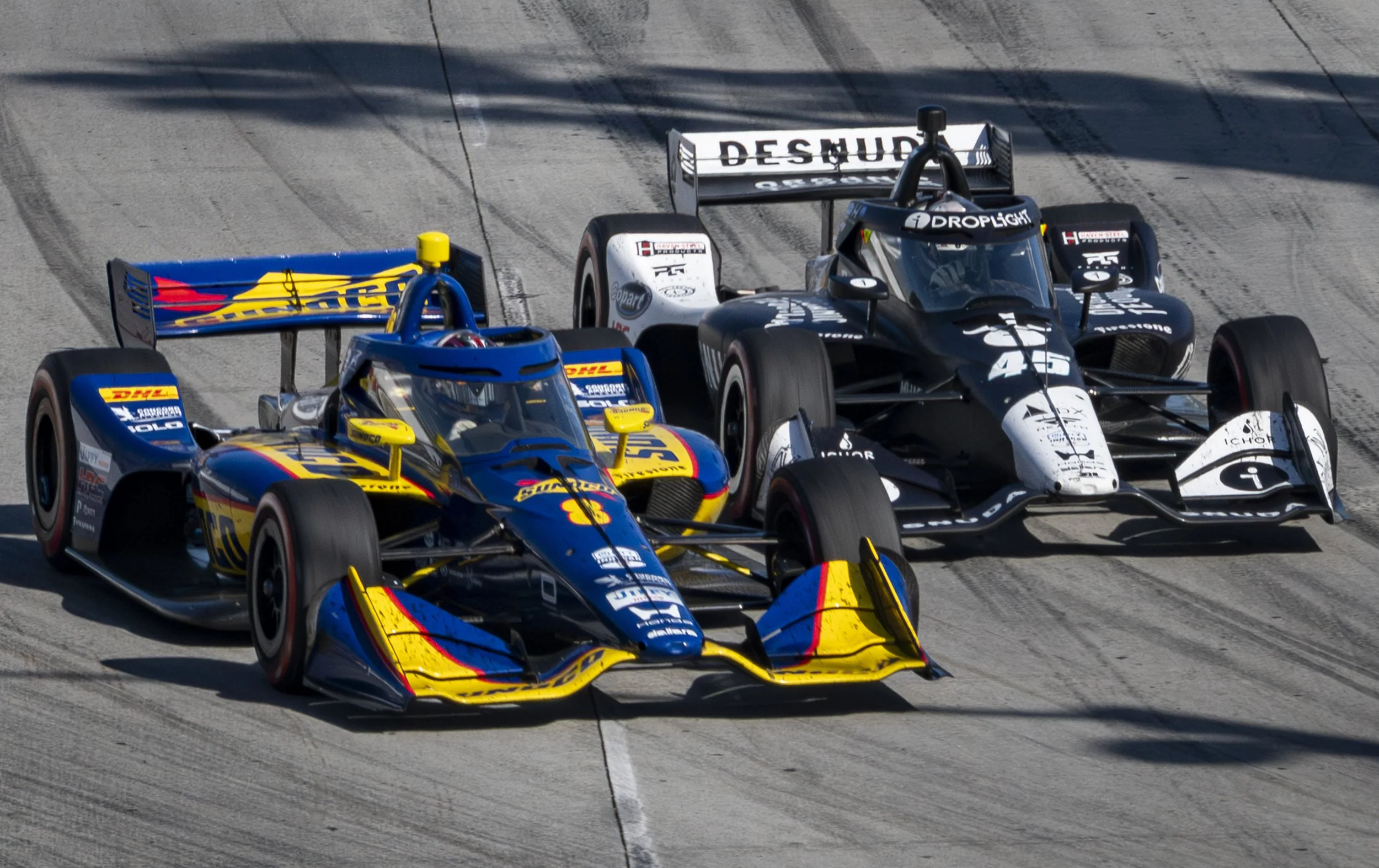  Nippon Telegraph and Telephone Corp (NTT) IndyCar series (L-R) no.8 of team Chip Granassi Racing driven by Kyffin Simpson & no.45 of team Rahal Letterman Lanigan Racing driven Louis Foster, as Foster no.45 attempts to overtake Simpson no.8 on Shorel