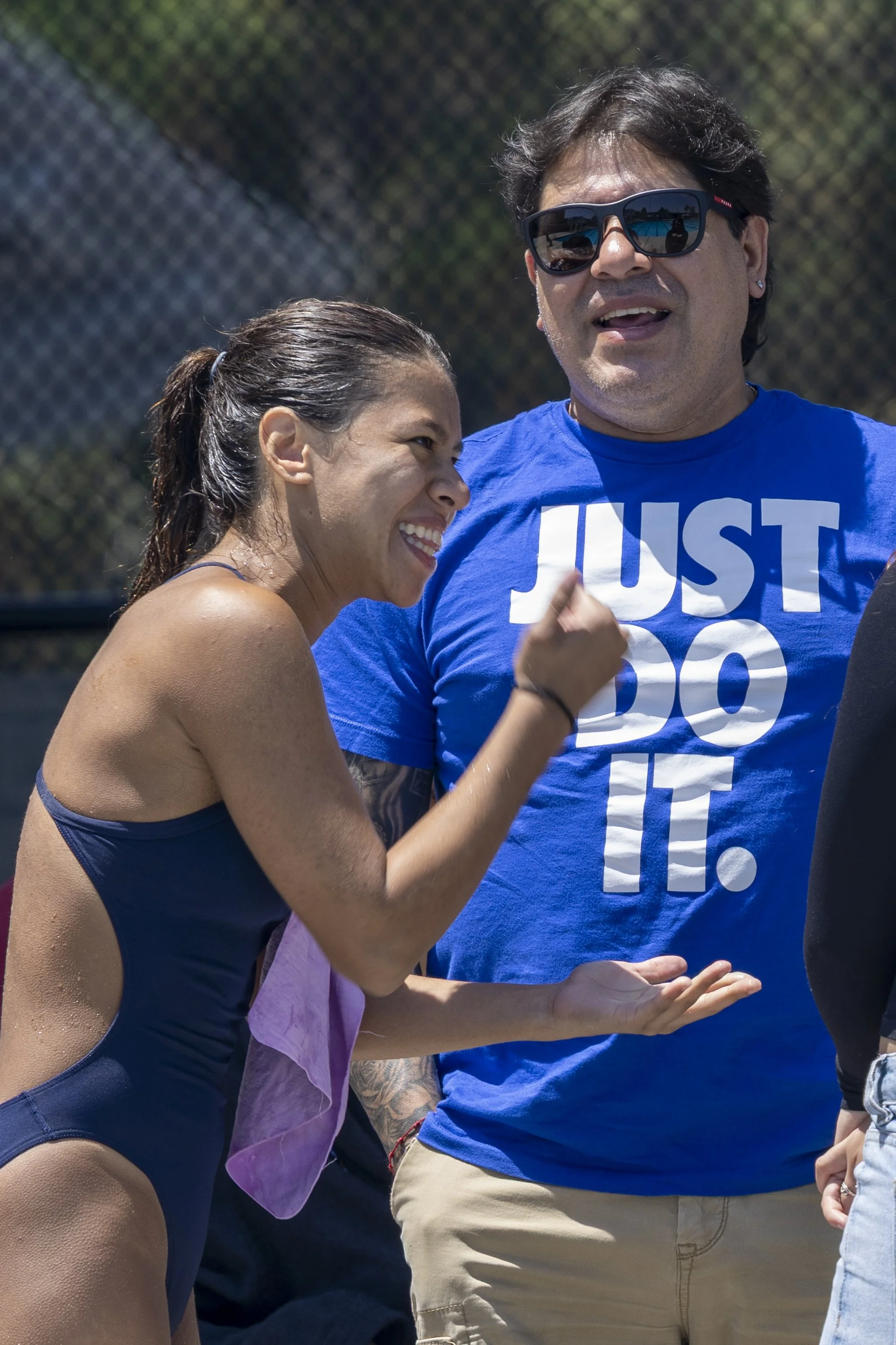  (L-R) Karla Perez, Santa Monica College Diving Corsair and a 2018 Youth Olympics Gymnast, talks among her dad, Juan Perez and family just before the start of the three-meter board finals at the 3C2A State Championship on Friday, May 1, 2026, at the 