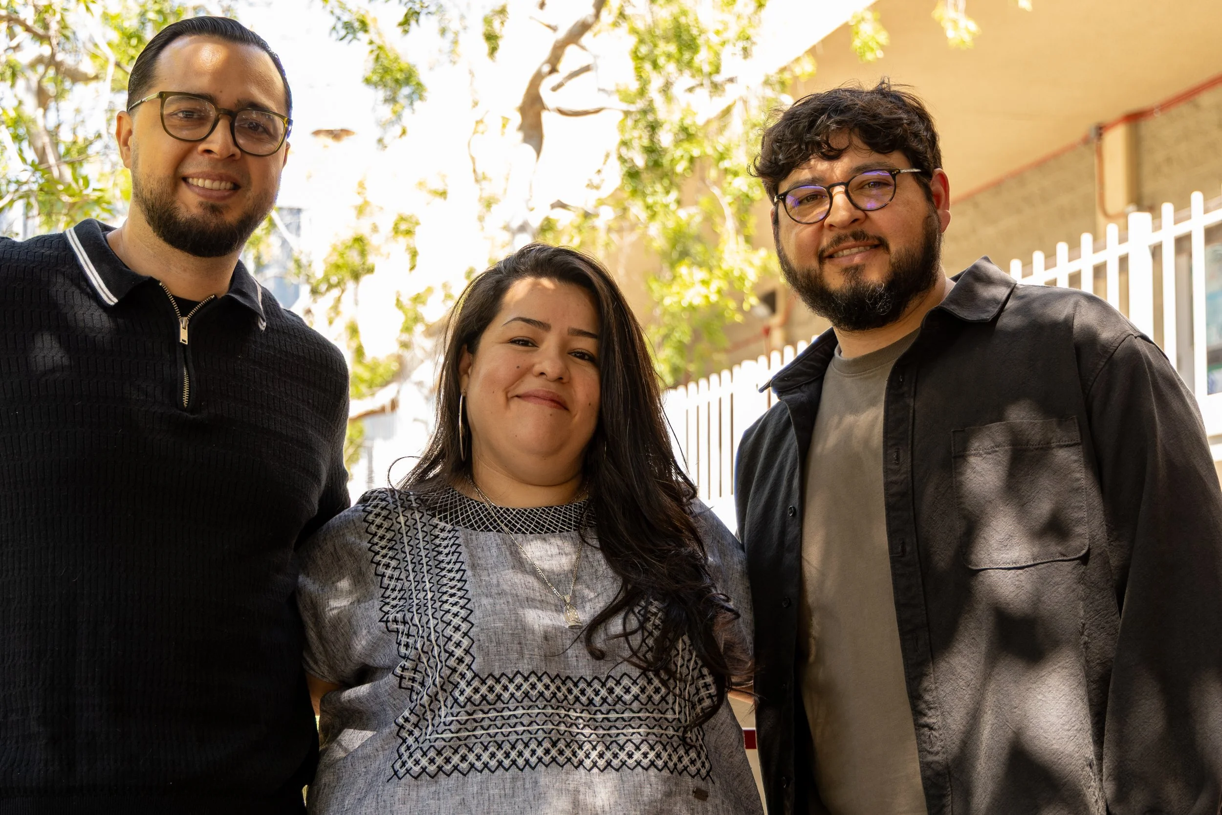  (L-R) Antonio Perez, first-generation Mexican-American artist, Santa Monica College (SMC) Art History Professor Erika Hirugami and Damon Casarez, an Artist specializing in photography stand for a picture after the event Antonio Perez & Damon Casarez