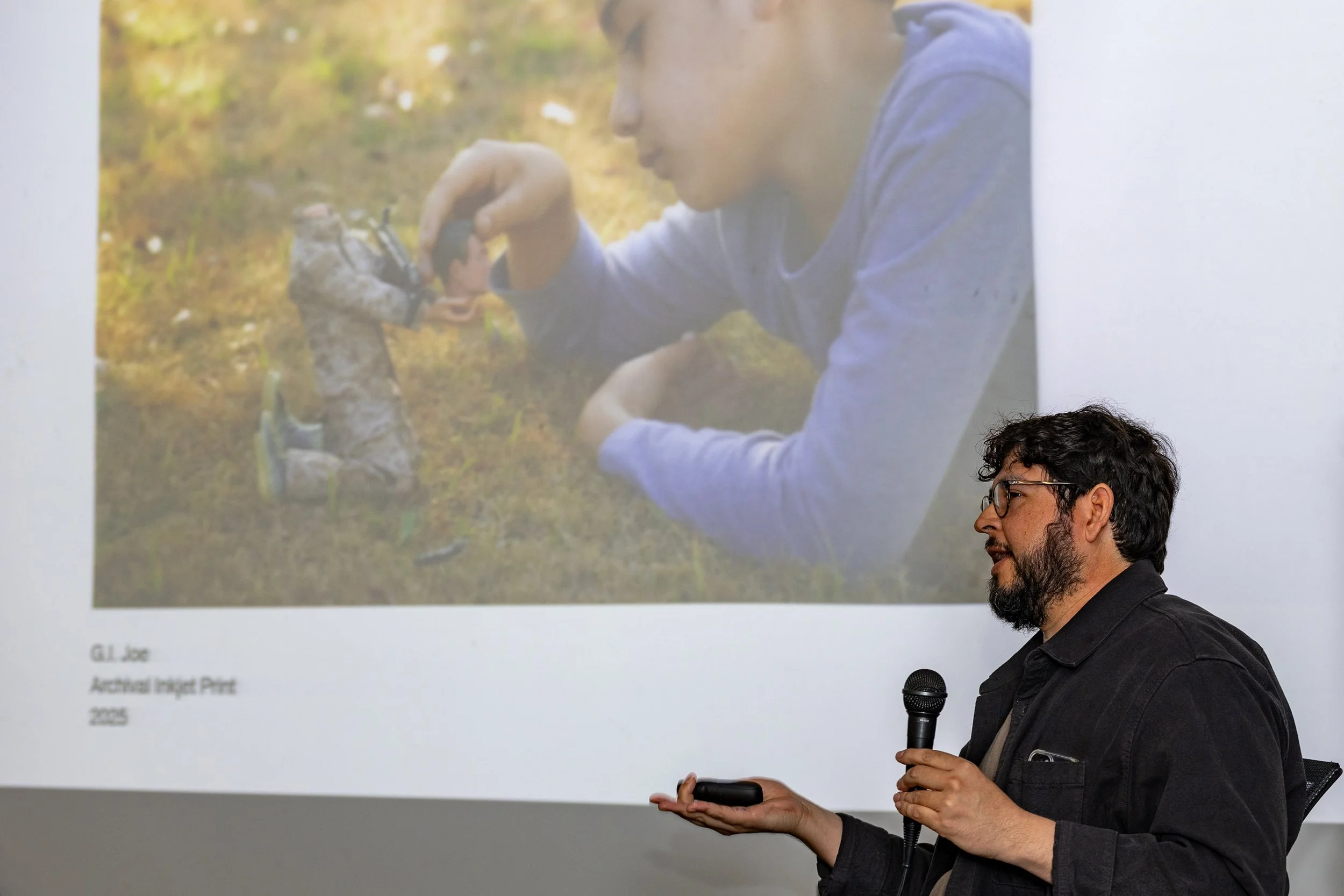  Damon Casarez, an Artist specializing in photography, speaks about his work ‘G.I. Joe’ at the event ‘Concrete Hope artists in Conversation’ in room A214 in the Art Building at Santa Monica College (SMC) Main Campus in Santa Monica, Calif., on Tuesda