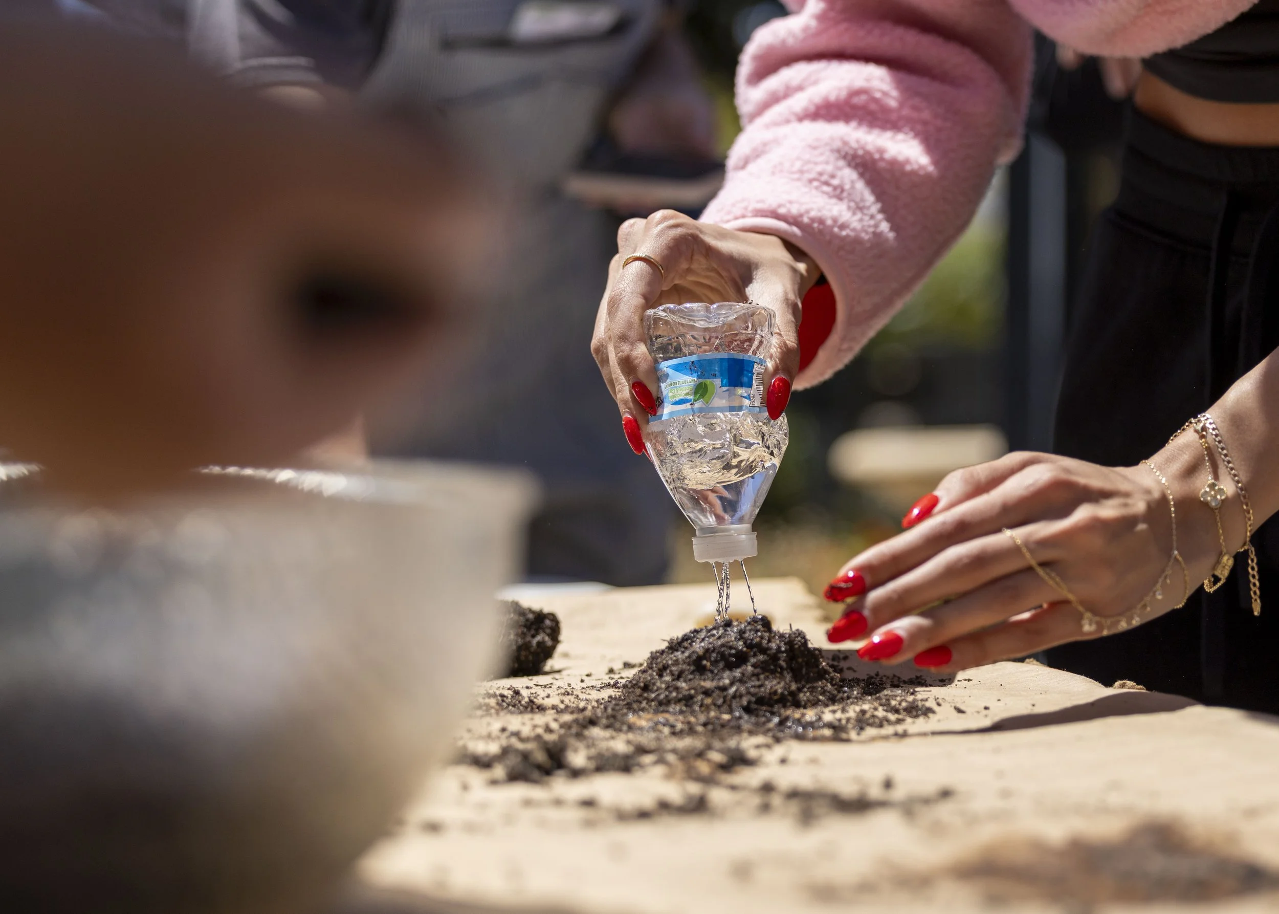  Santa Monica College student Savannah Youabian, a business major, participated in the Garden & Grow event on Earth Day at the SMC Organic Garden on the main campus in Santa Monica, Calif.,Wednesday, April 22, 2026.Students learned how to save and pl