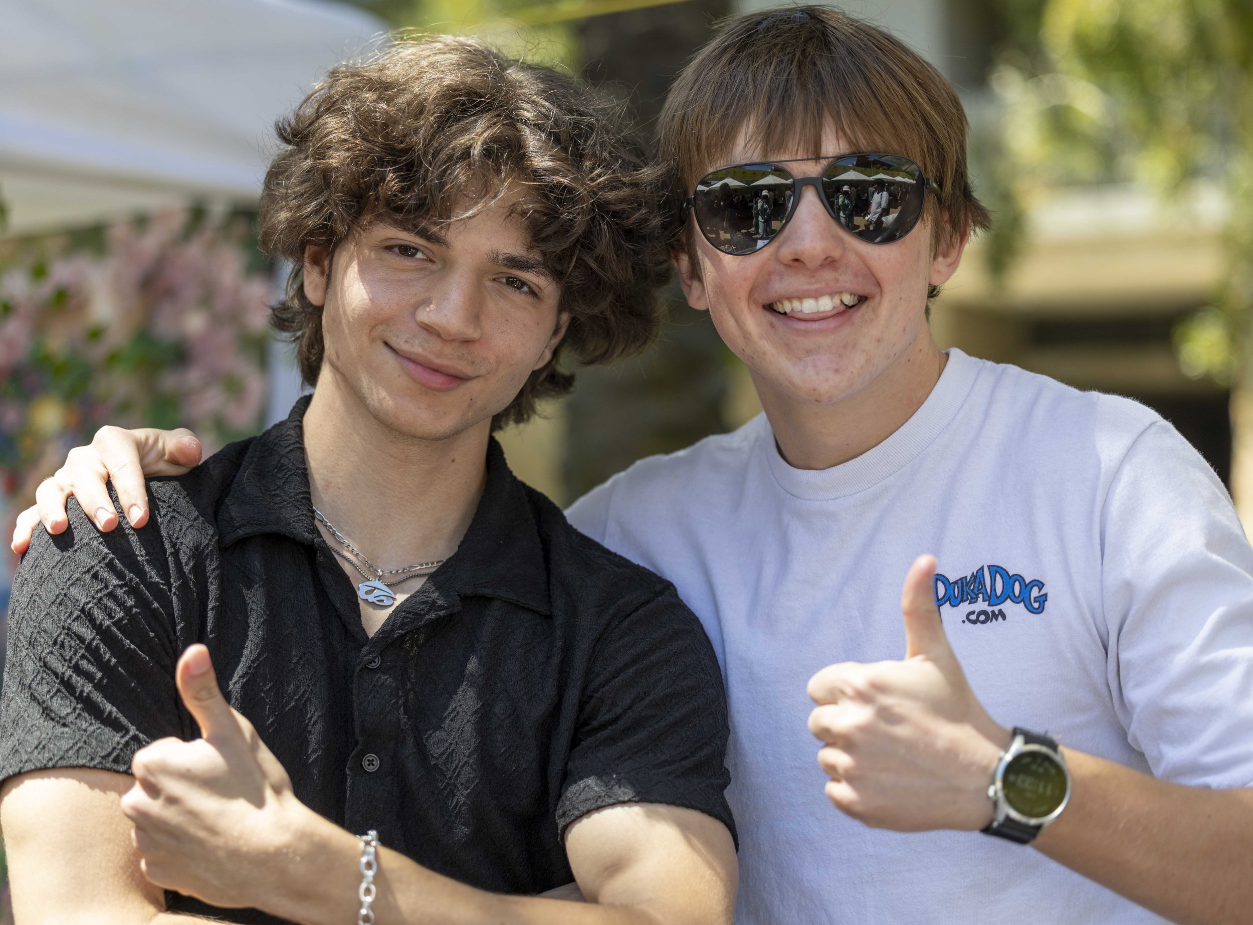  Santa Monica College (SMC) students Nader Omari, founder and president of the Future Business Leaders of America (FBLA) Club (left), and Jack Shnelder, vice president (right), during Club Row on the SMC main campus Quad in Santa Monica, Calif., on T