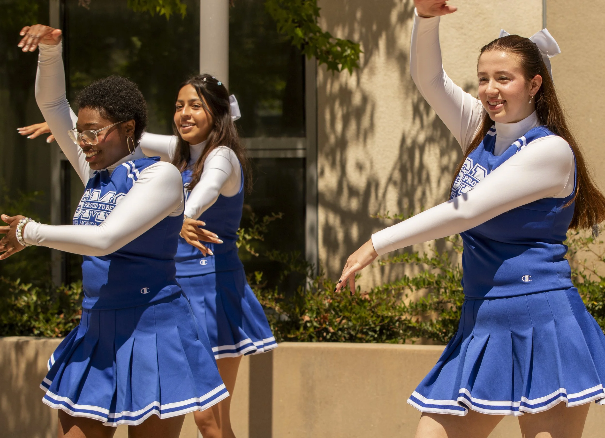  Cole Kahn (Left), Frida Macias (Center), and Amanda Bruers (Right) of the Santa Monica College (SMC) Cheer Club practice a dance for Tik Tok at Club Row Day at the SMC main campus on Thursday, May 7th, 2026. The Cheer Club is “a diverse, social just