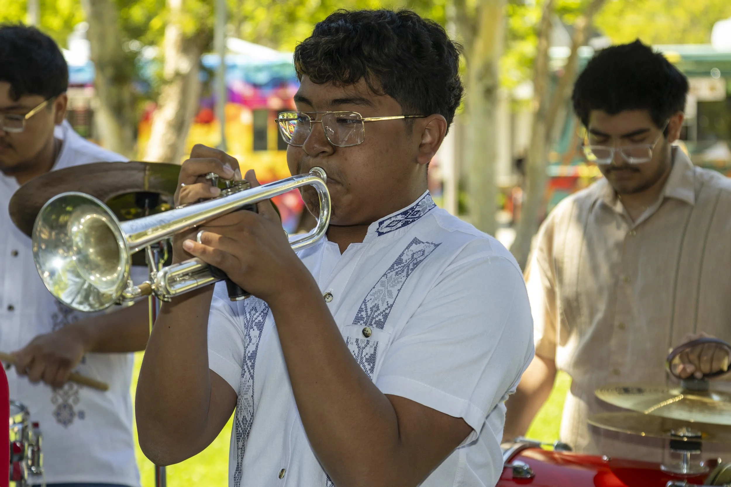  A student plays trumpet in the Banda Los Corsarios, a student organization which bills itself as "The Banda Oaxaqueña at Santa Monica College" (SMC)on the SMC campus, Thursday, May 8, in Santa Monica, Calif., during the Club Row event. Club Row feat