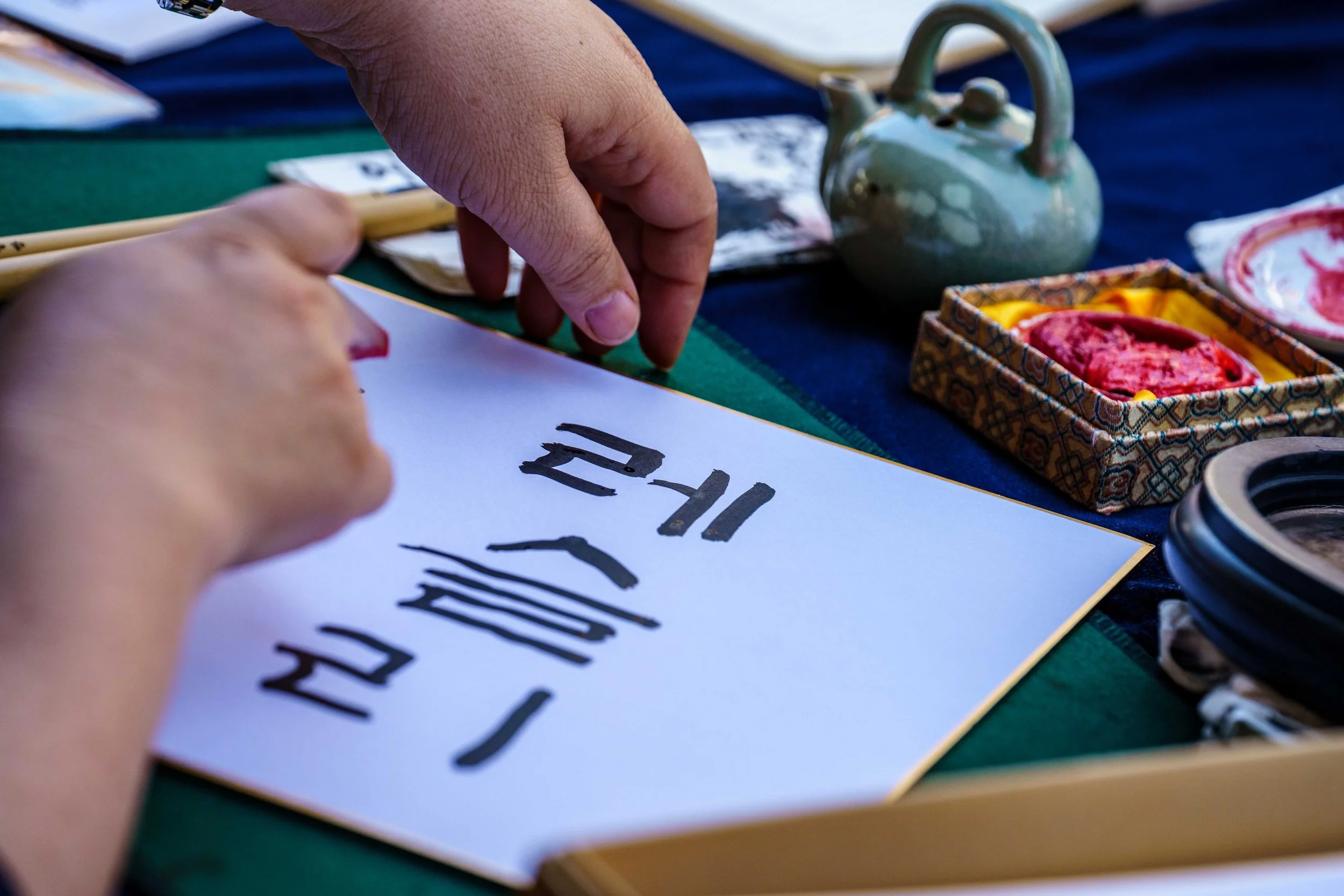  The name of an attendee written out in Korean characters at the Korean Cultural Center's exhibition tent during Los Angeles Times Festival of Books, Saturday, April 18, 2026. This year’s two-day annual festival spanned eight outdoor stages and 12 in