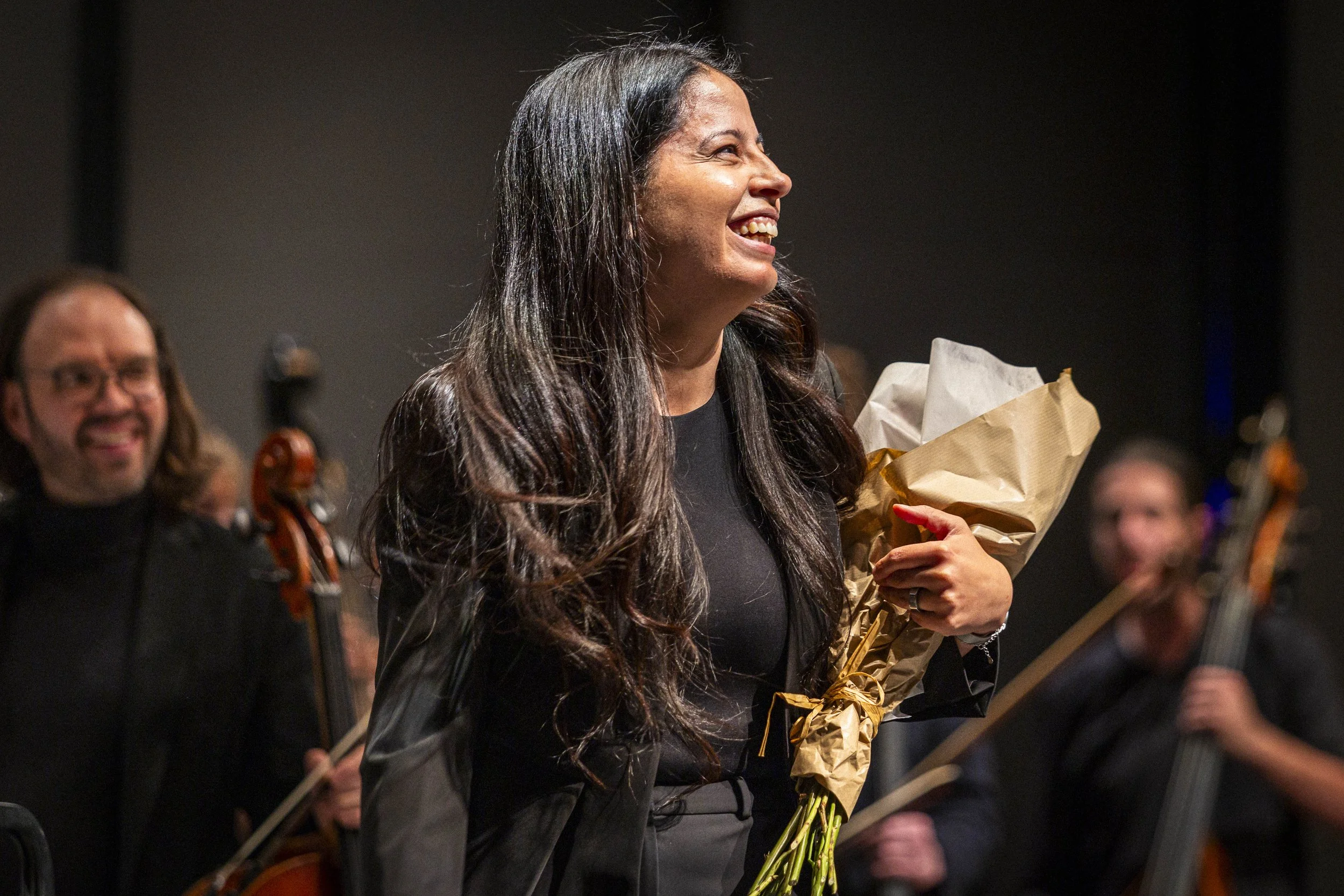  Santa Monica College (SMC) Symphony Orchestra's conductor, Mercedes Juan Musotto, smiles during the ovation after the special children’s concert on Sunday, April 26, 2026, at BroadStage at the SMC Performing Arts Center in Santa Monica, Calif. Prese
