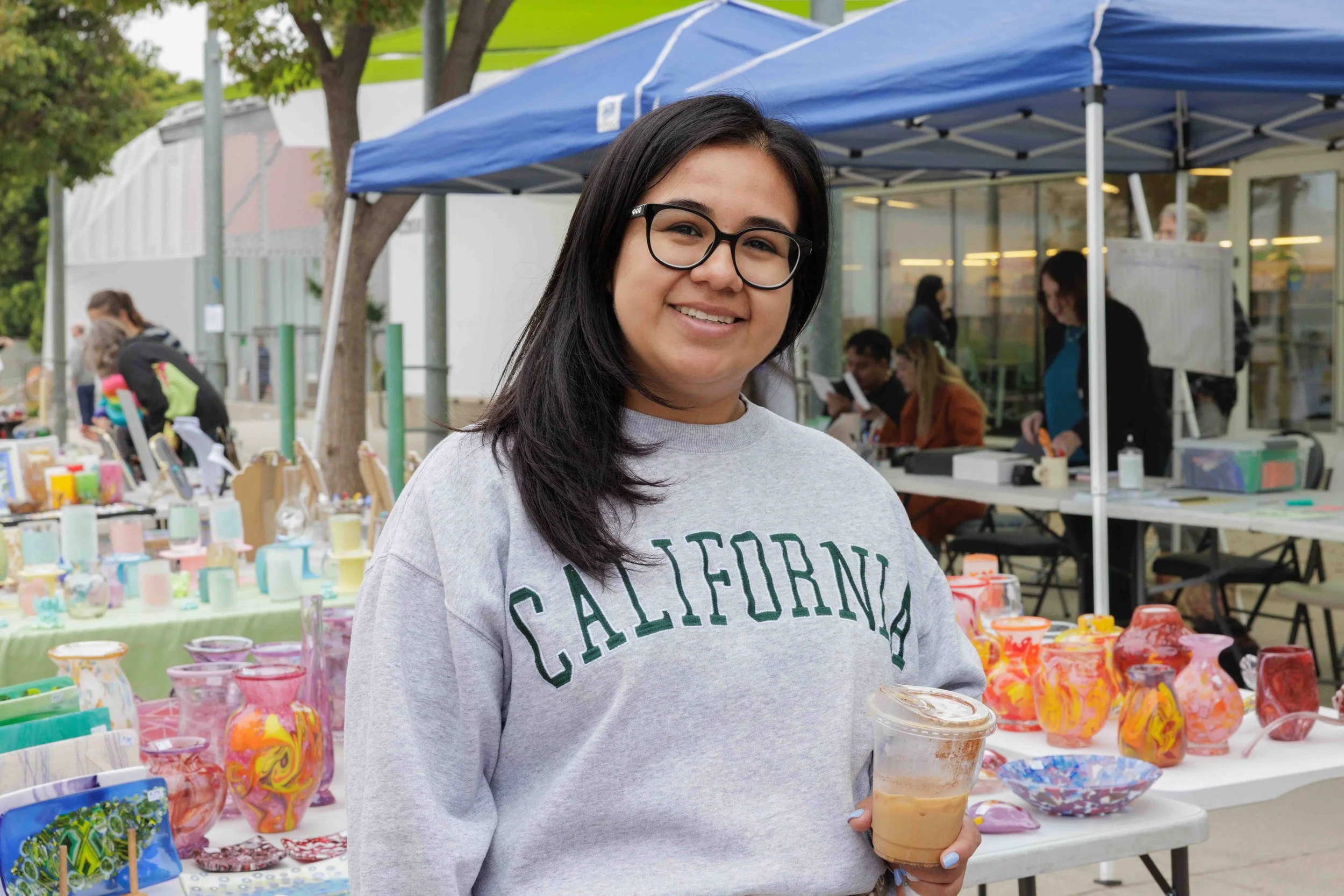  Visitor Maria De La Santos during SMC Art Department's Mother's Day Glass Sale at Virginia Park Farmers Market in Santa Monica, Calif., Saturday, May 2, 2026. The glass sale featured handmade pieces from SMC's glass sculpture and glass fusing studen