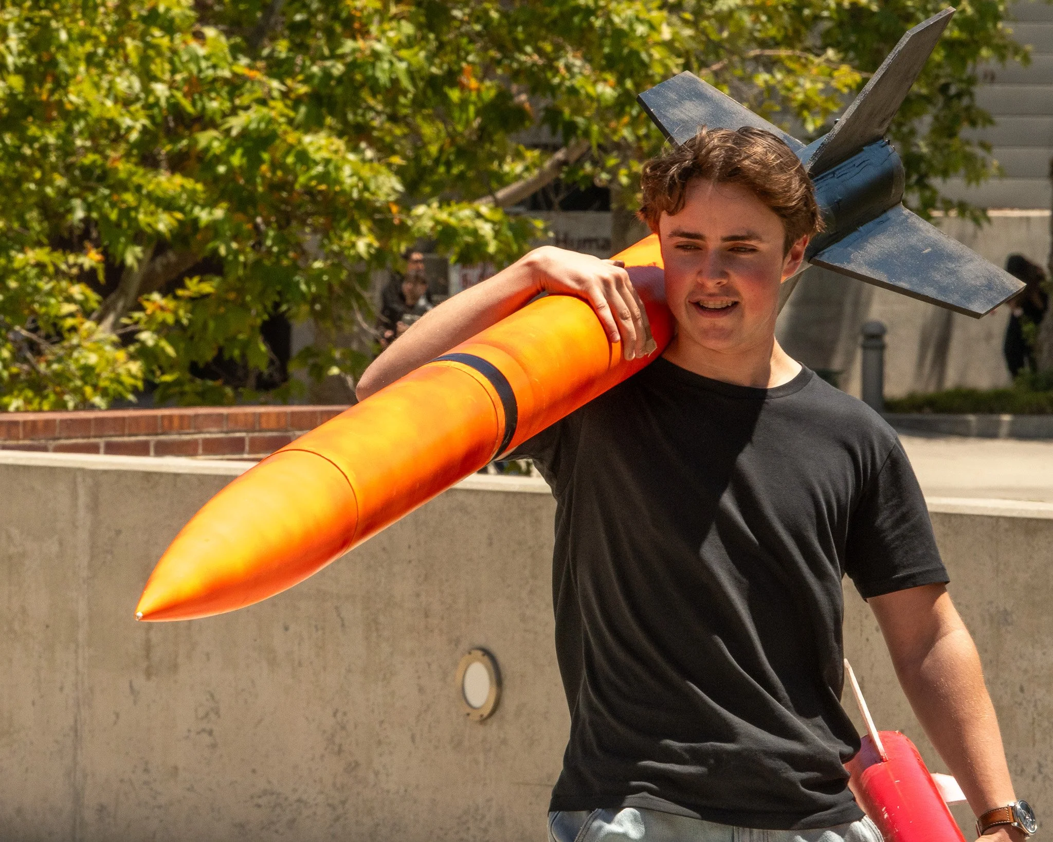  Santa Monica College Highpower Rocketry Club President James Tigran carries their rocket prototype after Club Row at Santa Monica College, Santa Monica, Calif., on May 7, 2026. (Karina Custodio | The Corsair) 