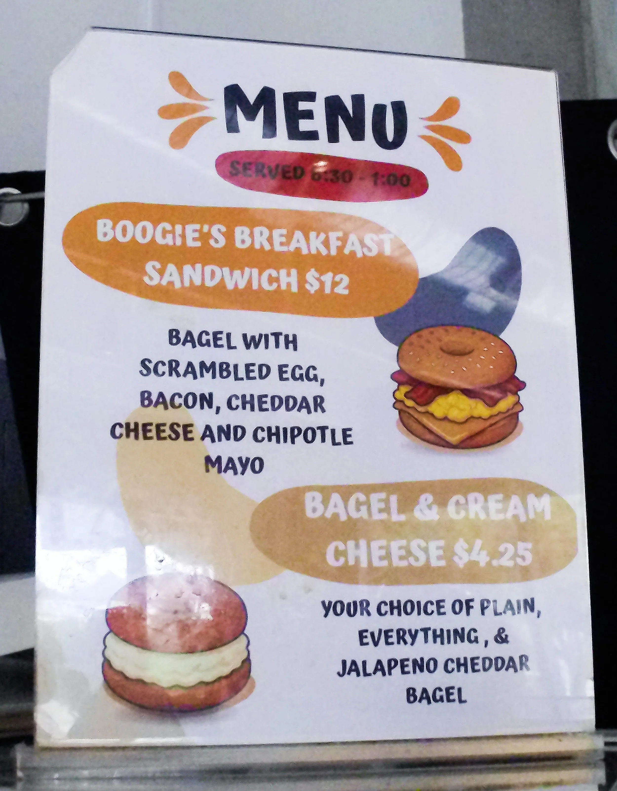  Cafe Ruisseau offers bagel breakfast sandwiches that are served from 8:30 a.m. until 1 p.m. daily. The “Boogie’s Breakfast Sandwich” costs $12. It’s a bagel with scrambled egg, bacon, cheddar cheese, and chipotle mayonnaise. A "Bagel & Cream Cheese"