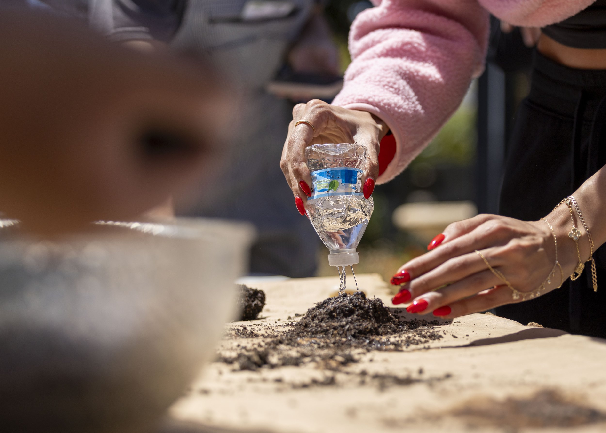  Santa Monica College student Savannah Youabian, a business major, participated in the Garden & Grow event on Earth Day at the SMC Organic Garden on the main campus in Santa Monica, Calif.,Wednesday, April 22, 2026.Students learned how to save and pl