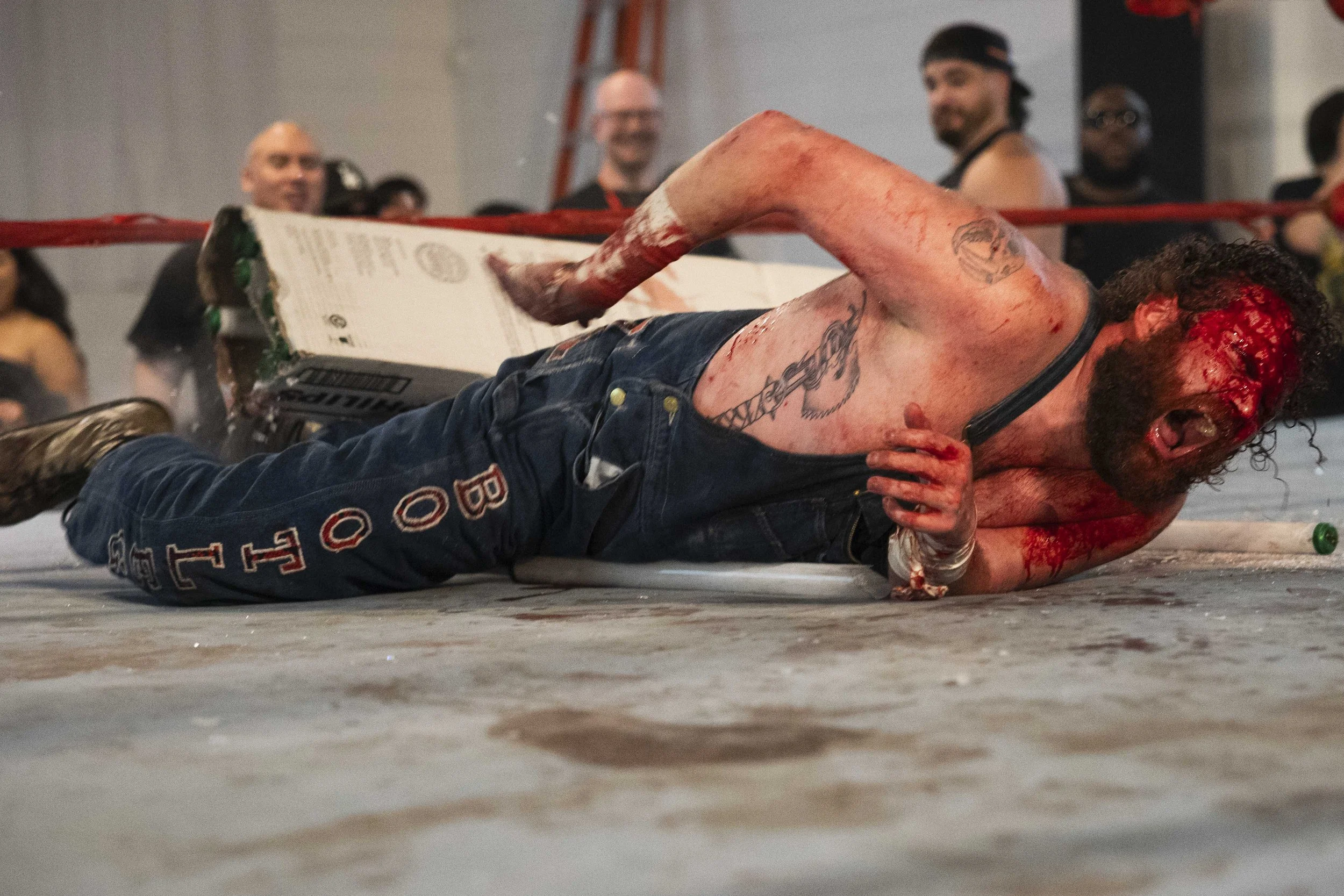  Deathmatch wrestler Bootleg Dave screams after losing two matches inside the LA Church in Los Angeles on Saturday, May 16, 2026, at Severe Violent Nature Wrestling’s Tell Me If I’m Telling Lies event. (Kayjel J. Mairena | The Corsair) 