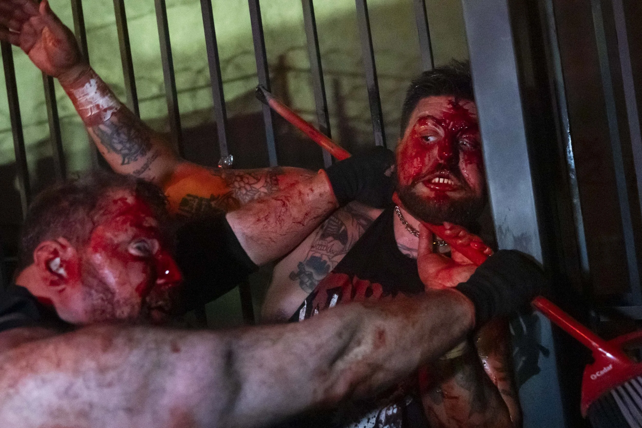  Deathmatch wrestler Phil Insane (L) chokes his opponent, Joe Dred (R), with a broom stick on the patio of the LA Church in Los Angeles on Saturday, May 16, 2026, seven months after being told he had to medically retire. (Kayjel J. Mairena | The Cors