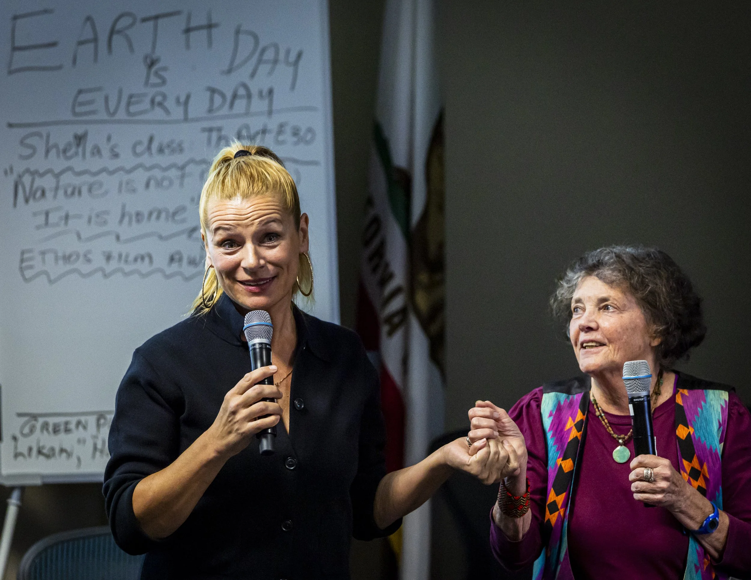  Director of the Ethos Film Awards Anabelle Munro (L), and Santa Monica College (SMC) Professor and filmmaker Sheila Laffey (R) introduce the screenings at “Earth Day at Emeritus” in the Auditorium at SMC's Emeritus Campus on Wednesday, April 22, 202