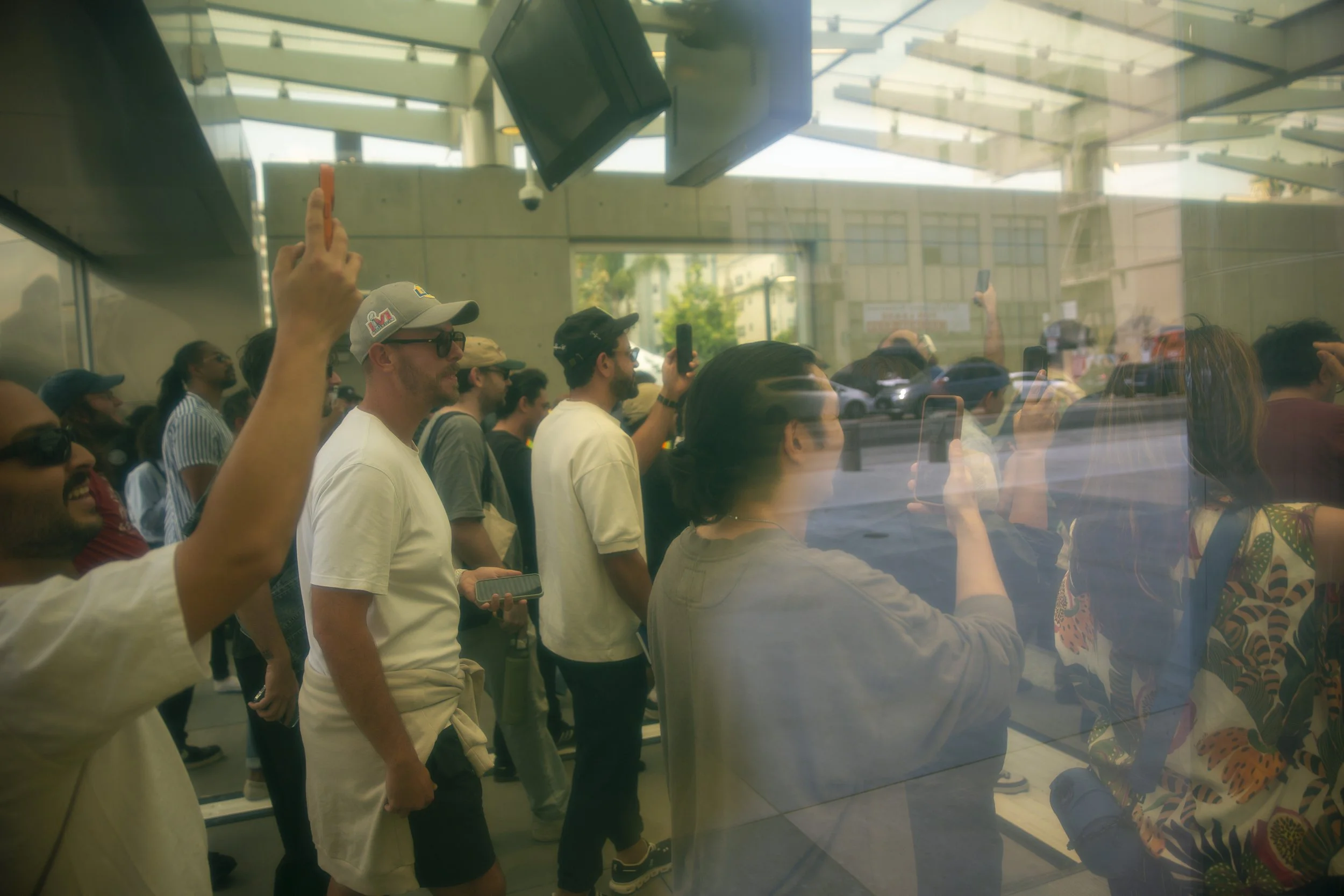  Los Angeles residents walk into the Wilshire/La Brea Station moments after it opened during the opening of Metro’s D Line Extension Section 1 in Los Angeles on Friday, May 8, 2026. (Jinhao Tian | The Corsair) 