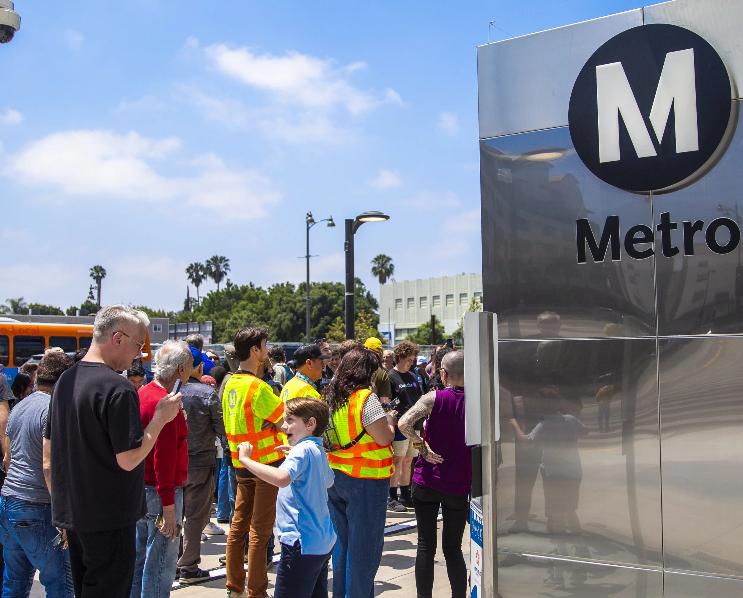  Los Angeles residents gather outside the Wilshire/La Brea Station before the opening of Metro’s D Line Extension Section 1 in Los Angeles on Friday, May 8, 2026. (Jinhao Tian | The Corsair) 