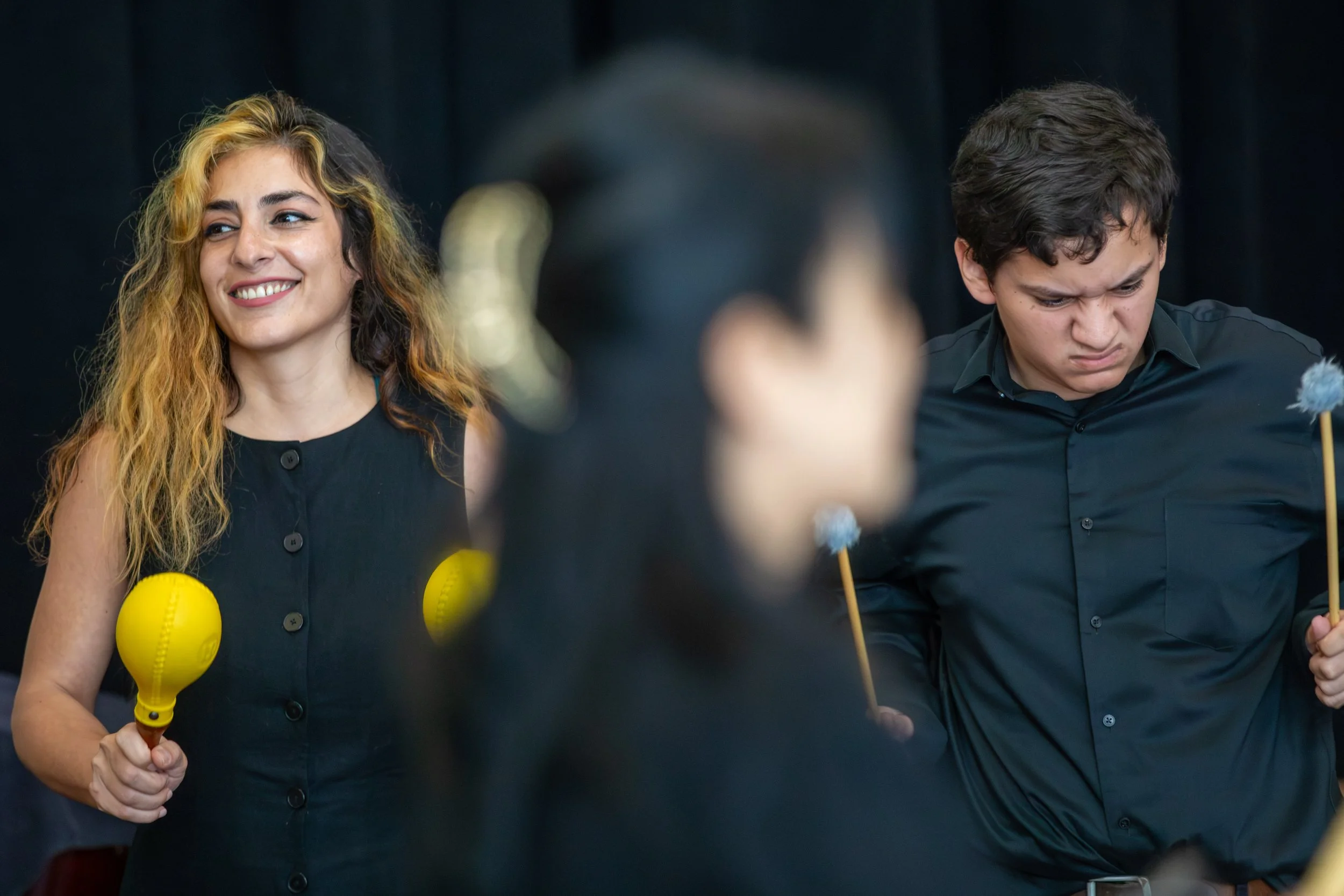  Santa Monica College students Tina Malekisantmaleki (left) and Aiden Arenas (Right) performs during the SMC Percussion Ensemble concert at the Santa Monica College Performing Arts Center. The show consists of various types of percussion under the di