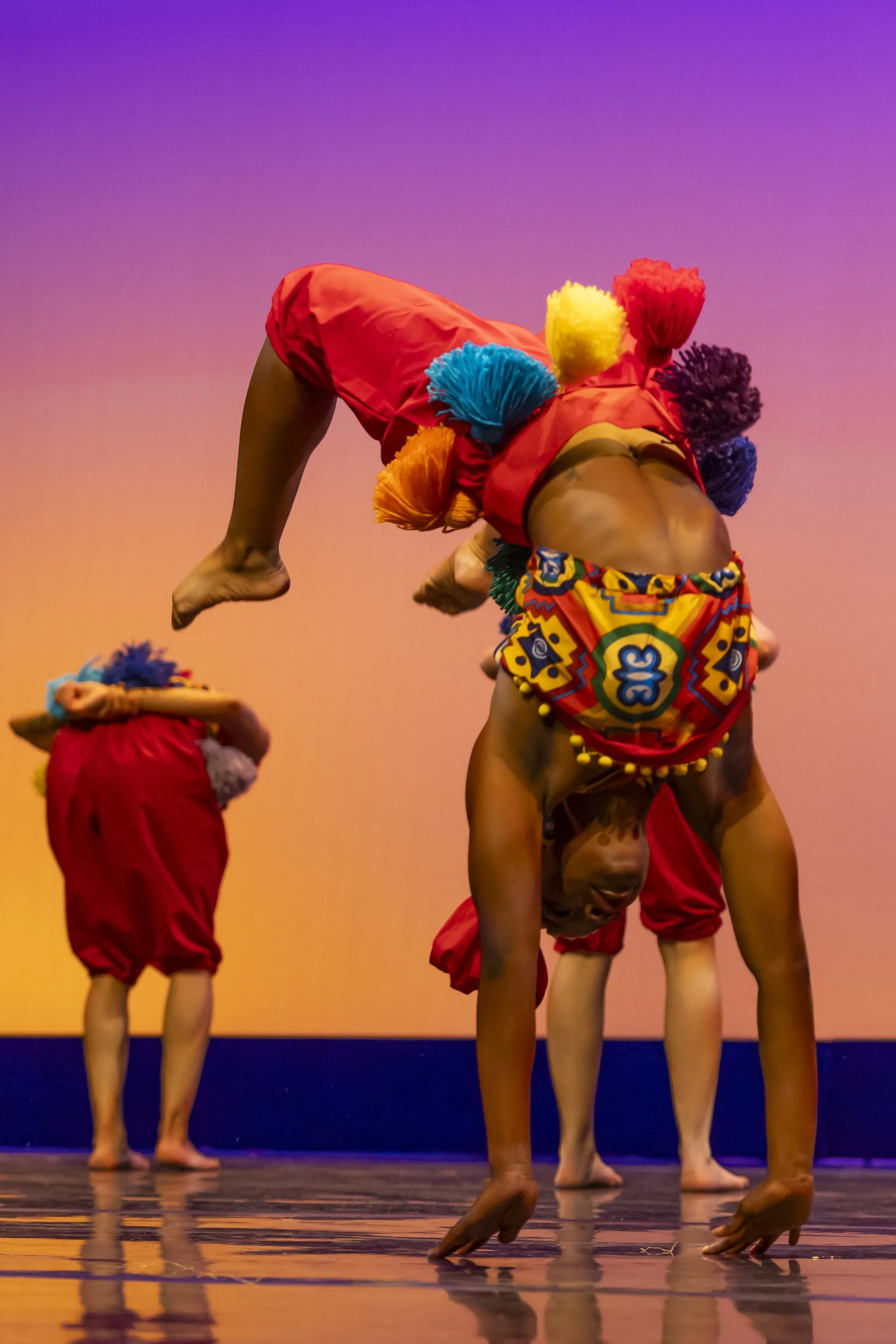  Kailyn Ferguson of Santa Monica College (SMC) World Dance Company performs back flips across the stage during a West African dance called ‘Manjani (Mendiani)’, choreographed by Angela Jordan, during a dress rehearsal for the upcoming show ‘Global Mo