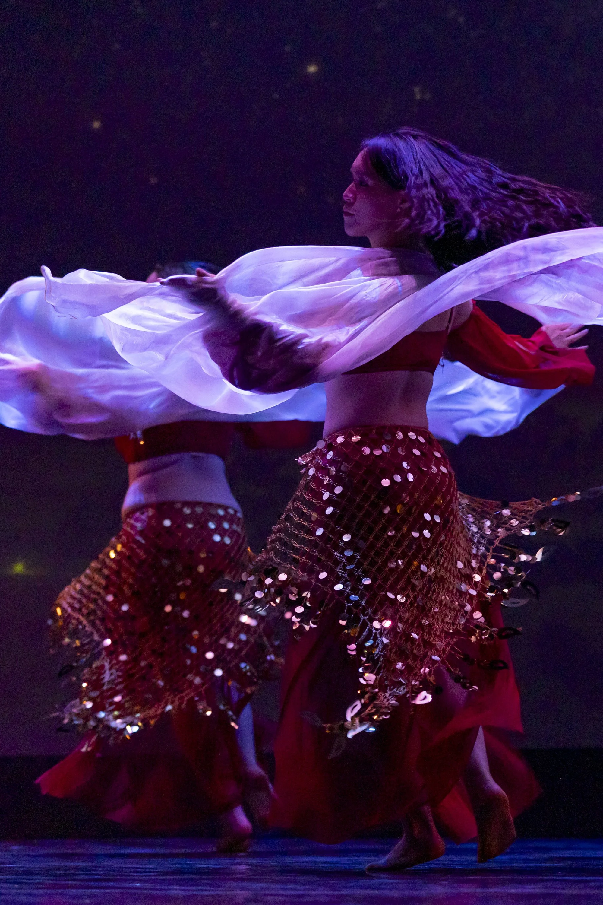  Santa Monica College (SMC) World Dance Company dancers swing their hips during a Moroccan Belly Dance called ‘Fusion’, choreographed by Ariel Kasha, during a dress rehearsal for the upcoming show ‘Global Motion’, on Wednesday, May 13, 2026, at Broad