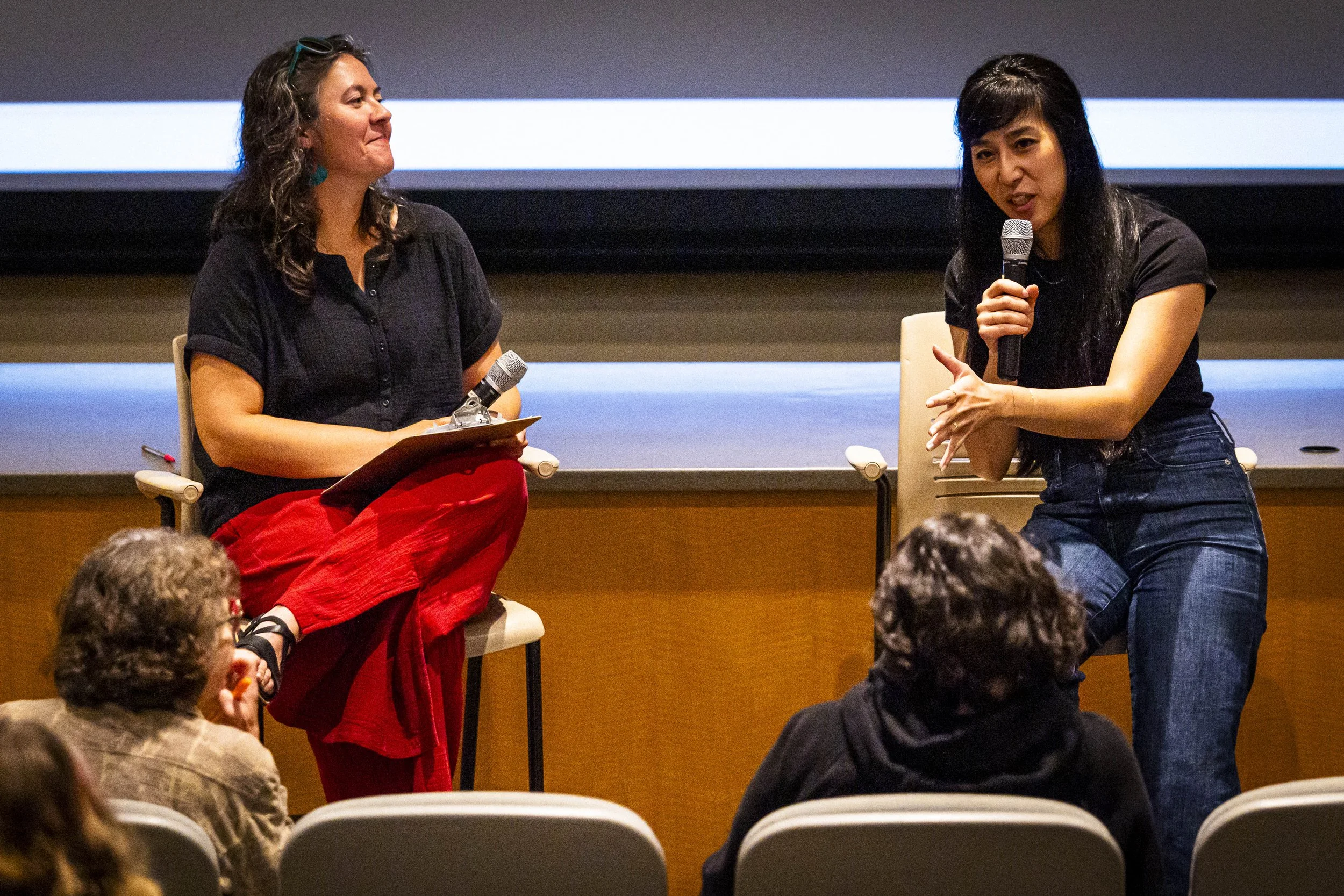  Santa Monica College (SMC) Earth Science Department professor Christyanne Melendez (cq) (L) and co-director and Los Angeles Times journalist Rosanna Xia (R) engage with the audience during the Q&A after the screening of “Out of Plain Sight,” a docum