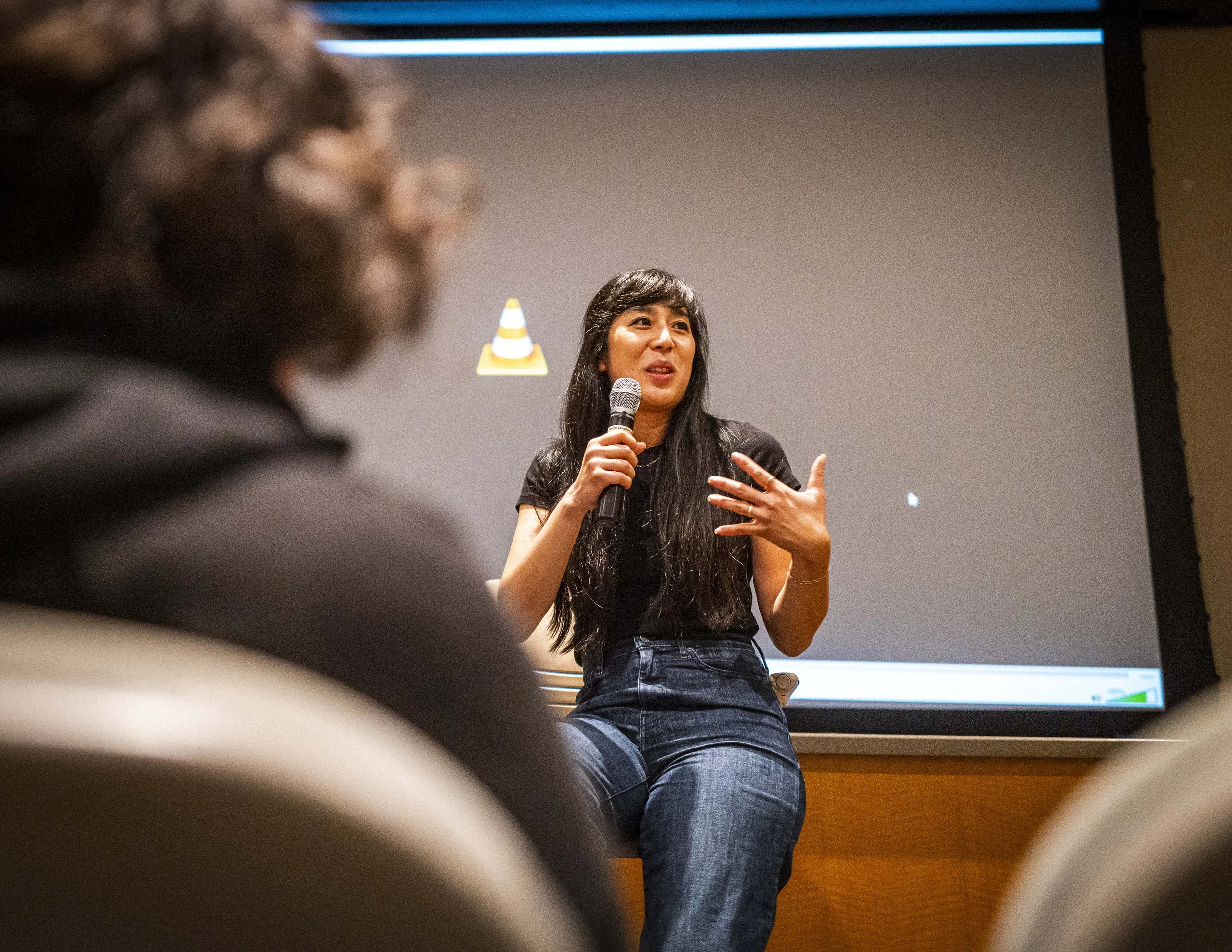  Co-director and Los Angeles Times journalist Rosanna Xia engages with the audience during the Q&A after the screening of “Out of Plain Sight,” a documentary about toxic dumping grounds off the coast of Southern California, in the Humanities & Social