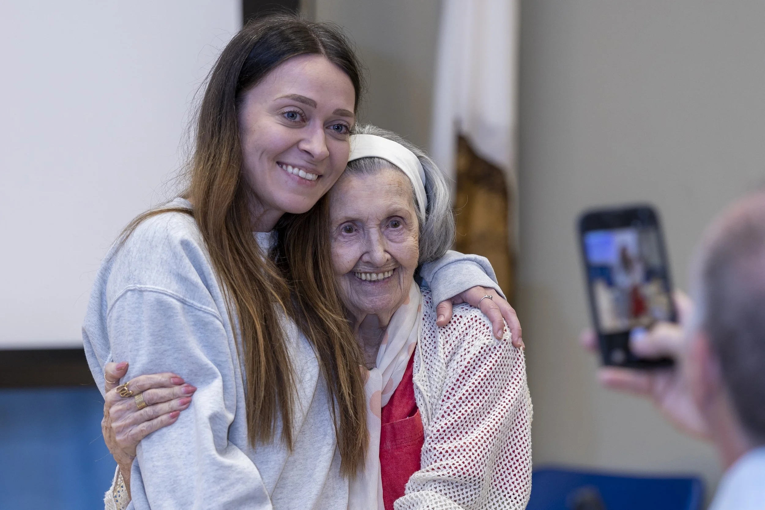 (L-R) Santa Monica College (SMC) student Klaudia Koza, a Computer Science major, and Holocaust survivor Mary Bauer, nearly 99 years old, stand for a photo taken by Dr. Scott Silverman, Dean of SMC Noncredit and External Programs after the event ‘A C