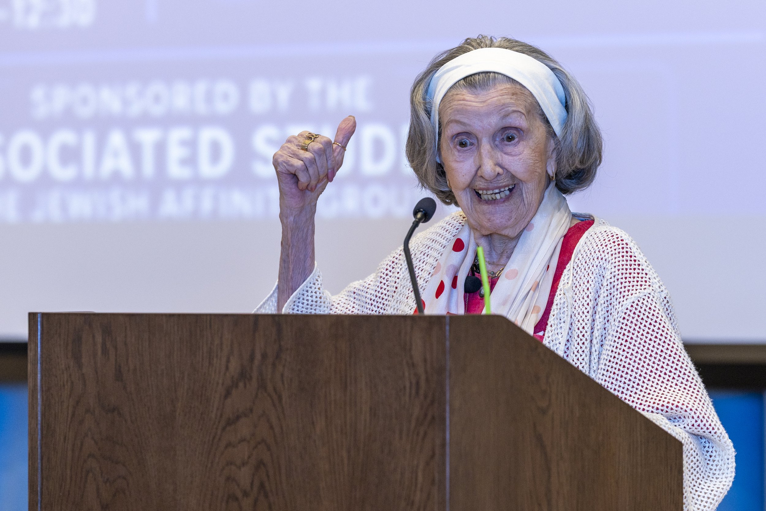  Mary Bauer, a nearly 99-year-old Holocaust survivor, introduces herself at the podium during the event ‘A Conversation with Holocaust Survivor Mary Bauer’ on Thursday, May 21, 2026, at Santa Monica College (SMC) Student Services Center, Orientation 
