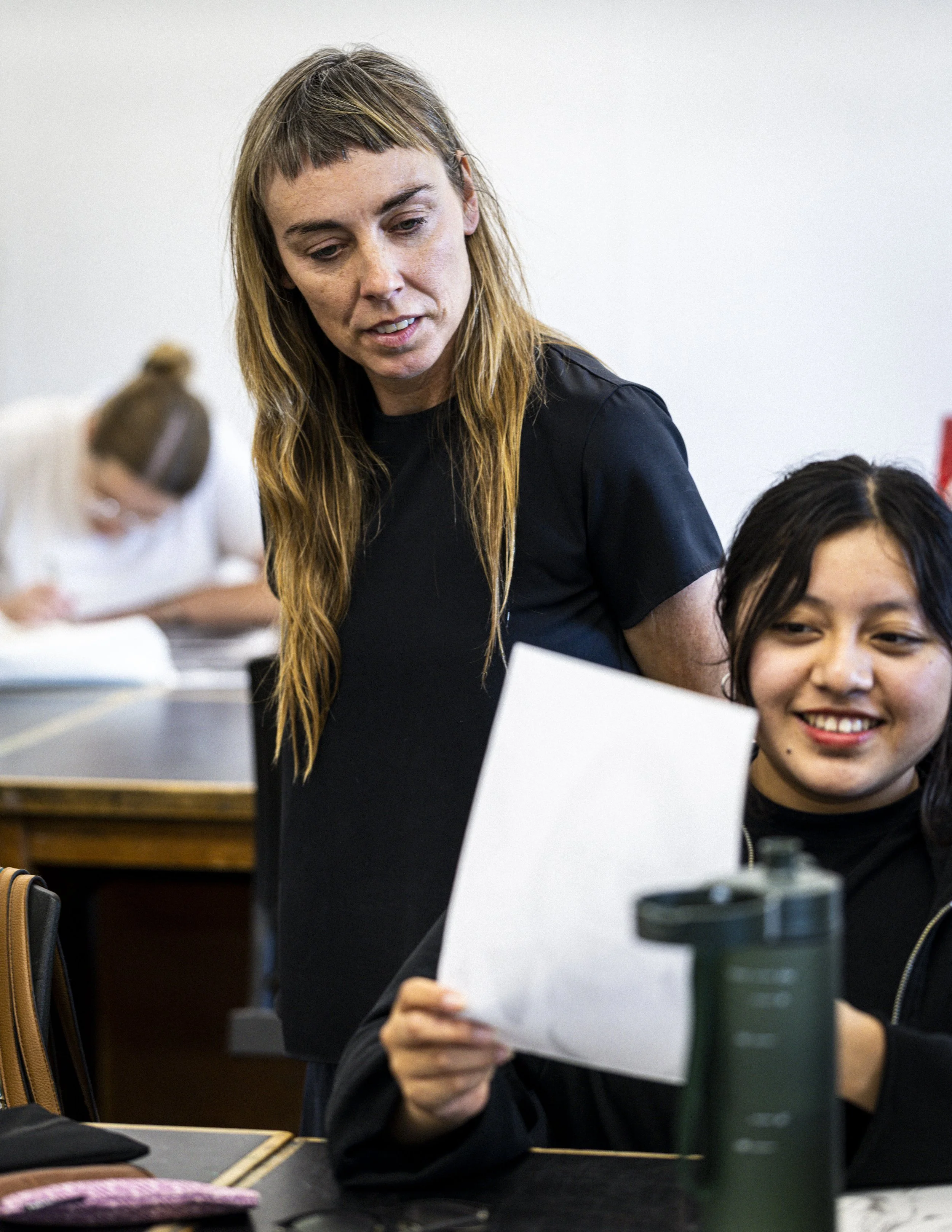  Santa Monica College (SMC) Art Professor Liv Aanrud (L) looks over SMC student Janet Santiz (R) work during class in the Art Building on Wednesday, May 27, 2026, at SMC’s Main Campus in Santa Monica, Calif. Aanrud recently joined SMC’s Art Departmen