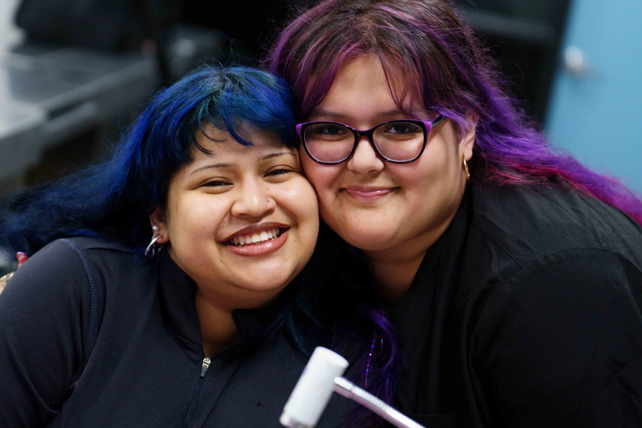  (L-R) Santa Monica College cosmetology majors Lesli Stephani Vargas Martinez and Delyla Fletes pose for a portrait for a quick moment while Martinez does nails inside the cosmetology department’s salon at the SMC Business Building in Santa Monica, C