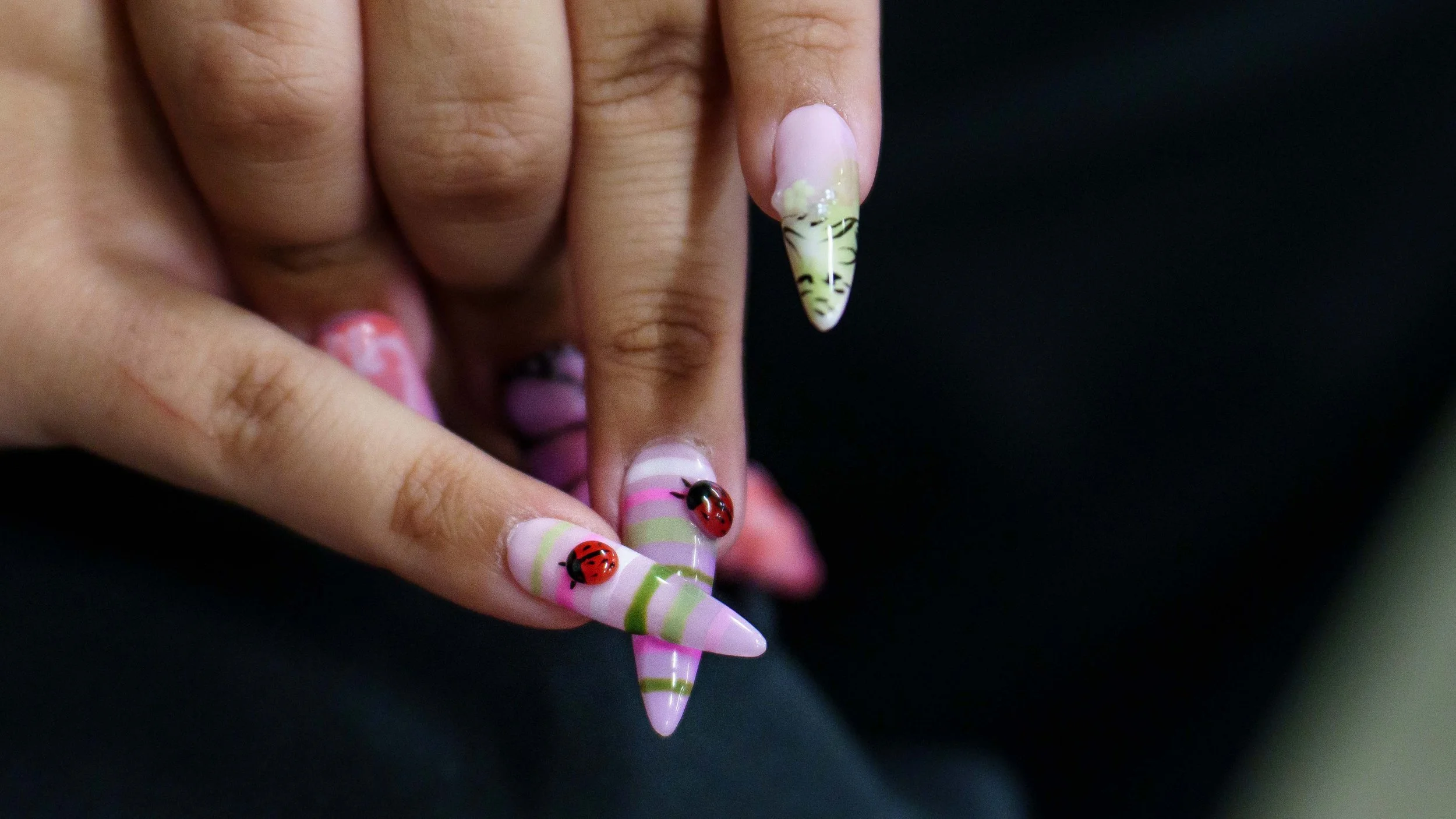  Santa Monica College (SMC) cosmetology student Delyla Fletes shows off ladybug art on her self-done nails inside the cosmetology department salon at the SMC Business Building in Santa Monica, California, Tuesday, June 2, 2026. (Elizabeth Bacher | Th