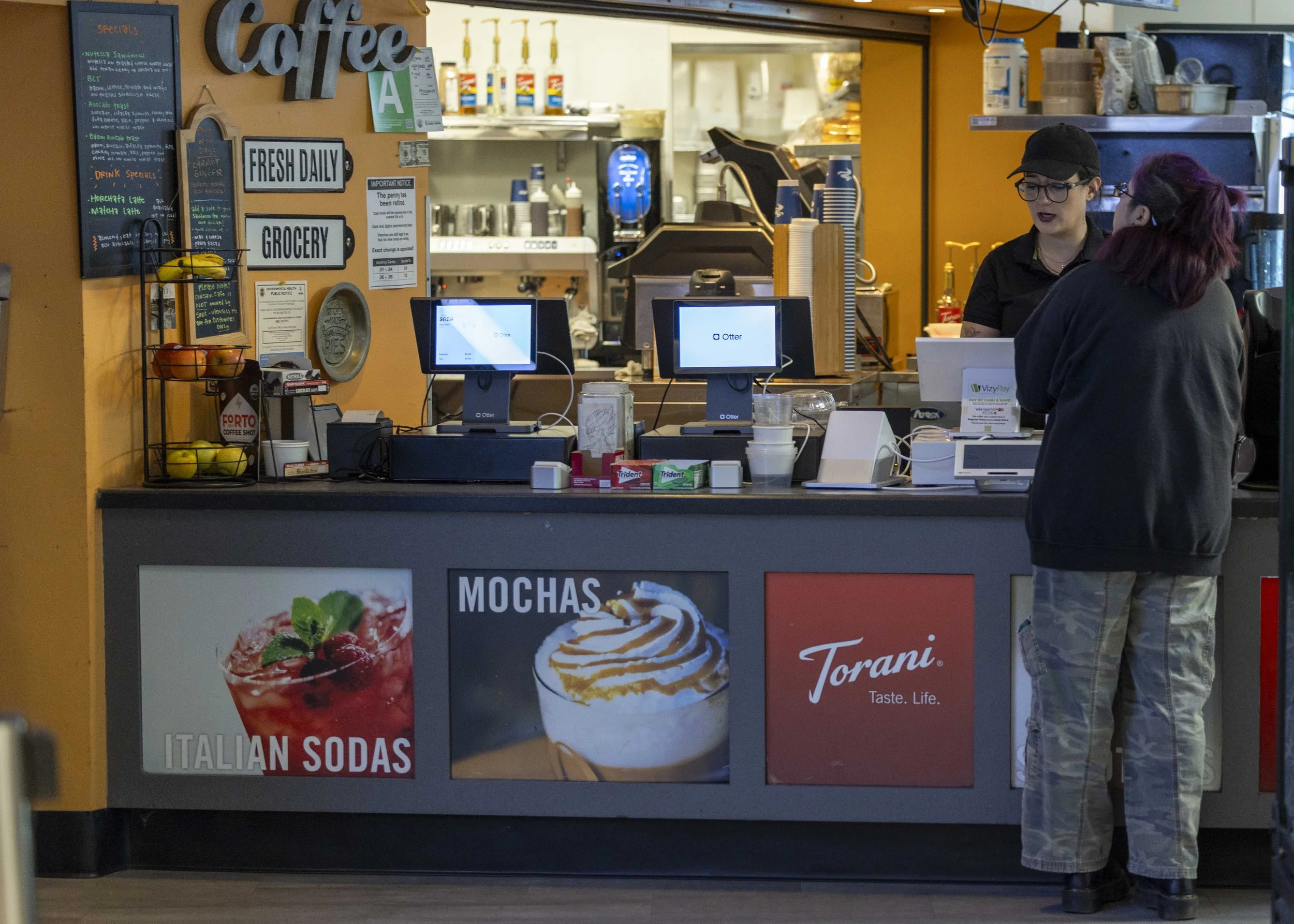  Santa Monica College cafeteria cashier Lucia Izaguirre Castelluí assists students at the SMC cafeteria on the main campus in Santa Monica, Calif., on Wednesday, April 29, 2026.Students visit the cafeteria throughout the day for meals, drinks, and sn