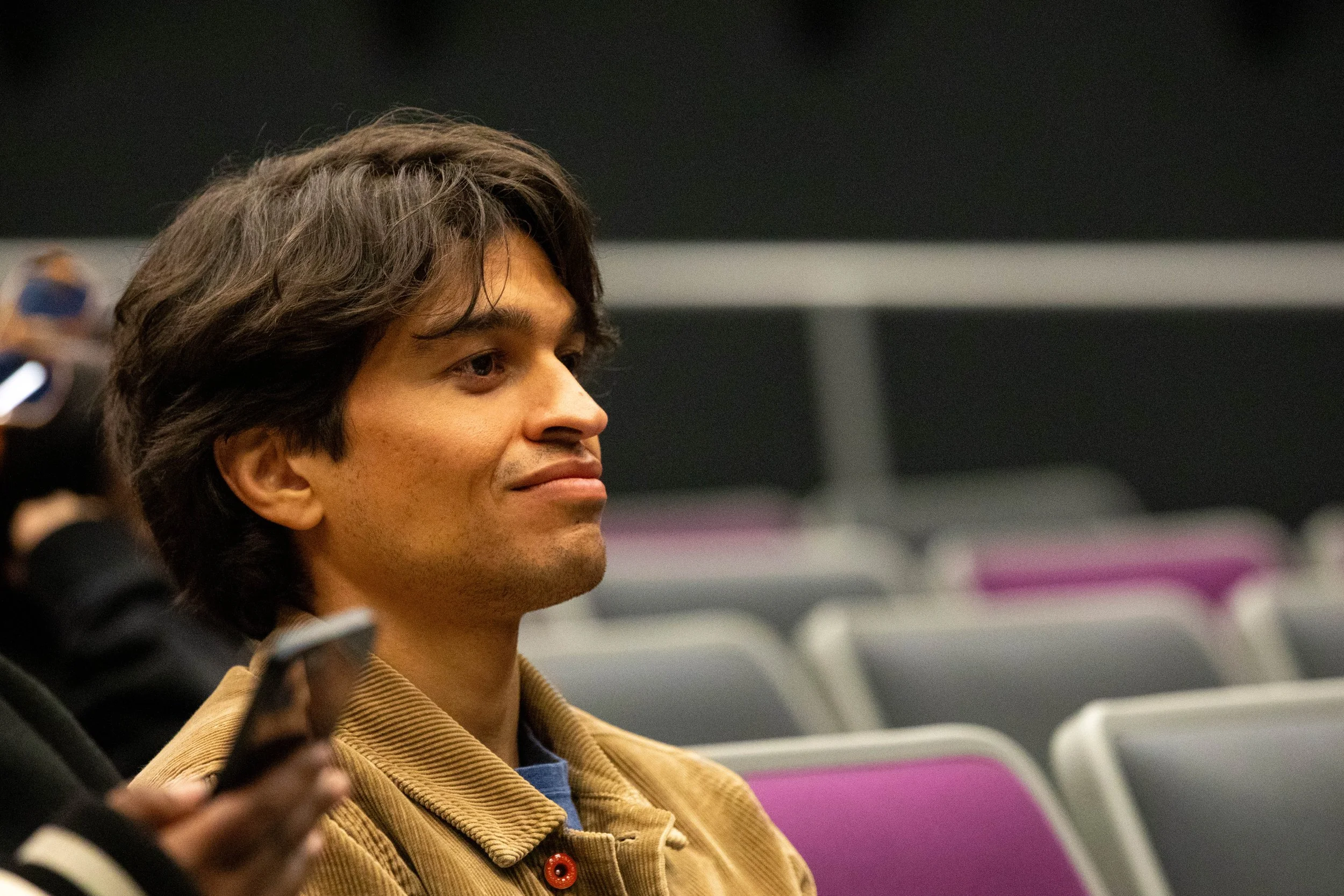  An audience member listens during the Q&A following a screening of the comedy documentary ROB on Friday, May 30, 2026, at the Santa Monica College Center for Media & Design in Santa Monica. (Kantapong Wongjirasawad | The Corsair) 
