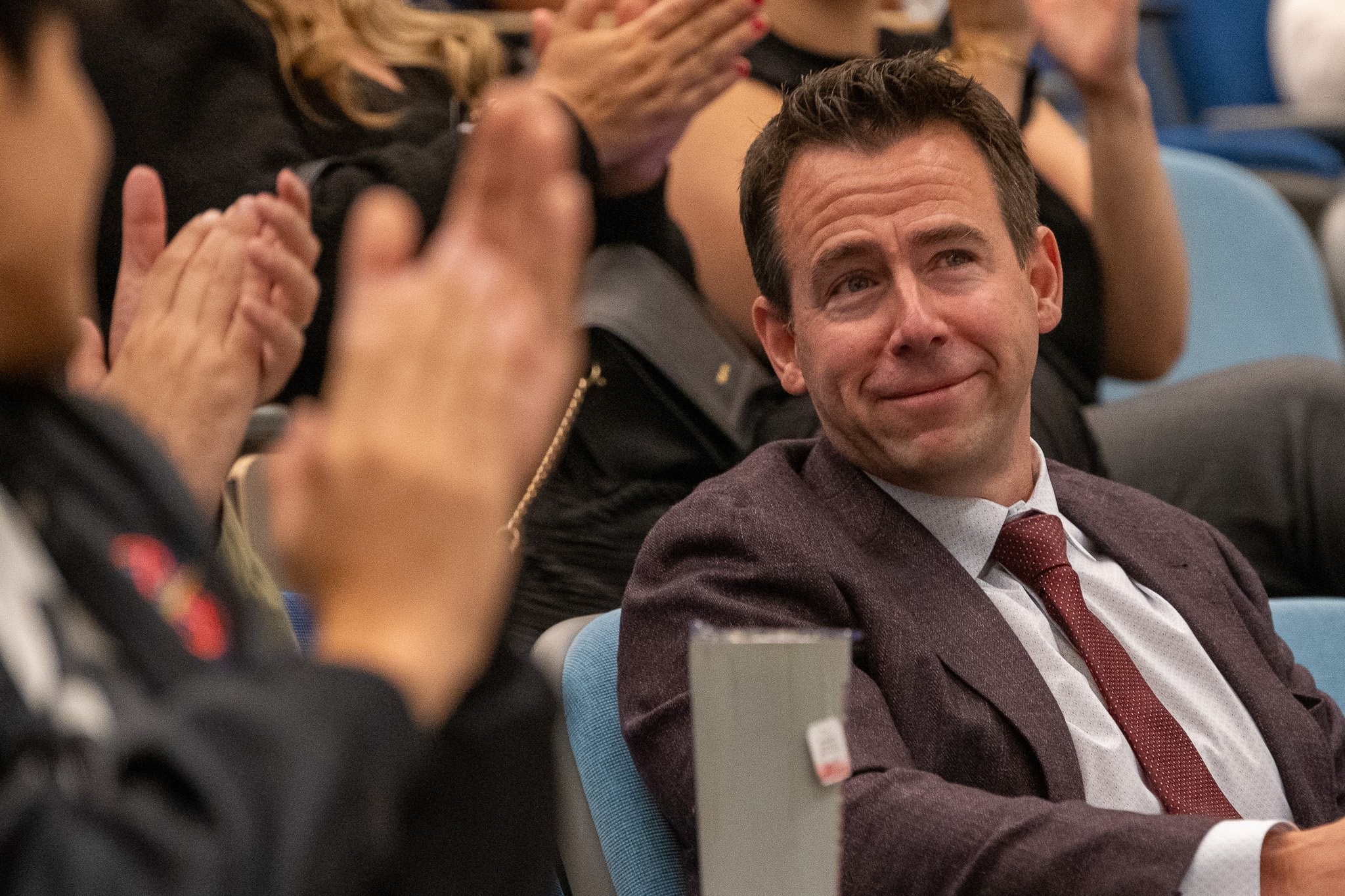  Shark's Valley judge and Founder of BoCG Ventures, Lyon Kassab receives a round of applause from Santa Monica College (SMC) students during the Shark's Valley event held at the Oreientation Hall, Student Education Center in Santa Monica, Calif. on M