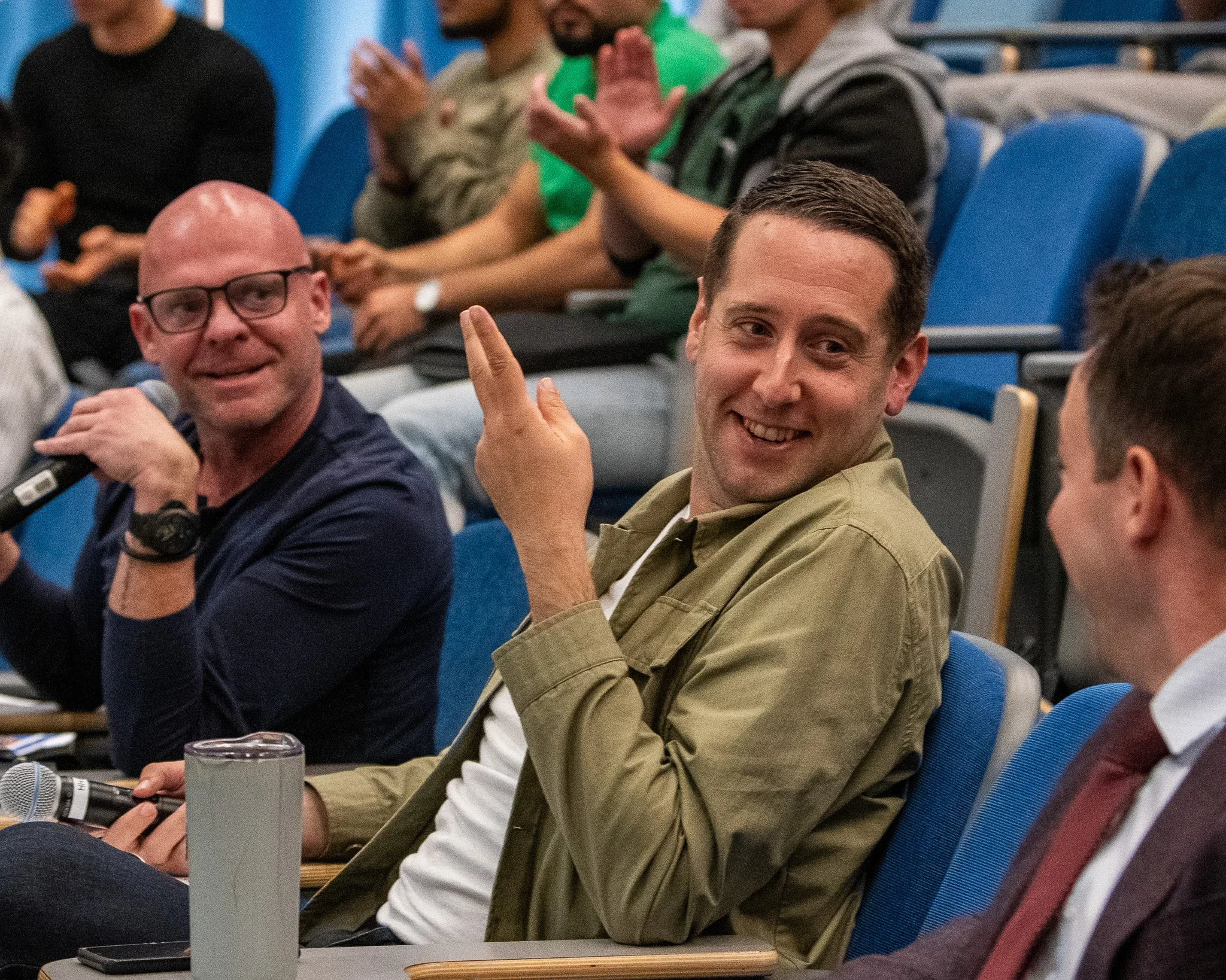  (L-R) SMC Shark's valley judges, Tony Giordano, Dan Eidell, & Lyon Kassab conffering amongst each other after the REv-Lev pitch deck during the Shark's Valley event held at the Oreientation Hall, Student Education Center in Santa Monica, Calif. on M