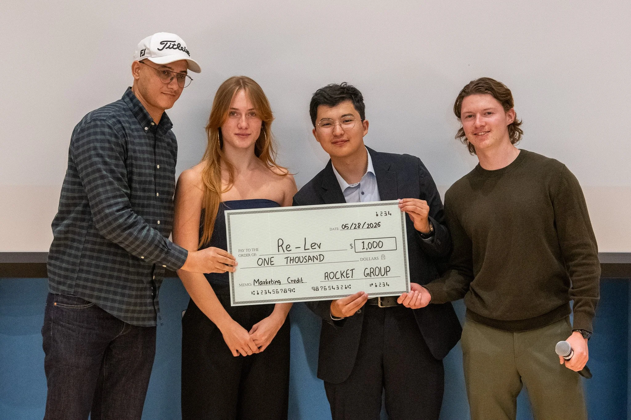  SMC Shark's Valley Third place award goes to start up comapany Rev-Lev. (L-R) Hocine Boulares, Sofia Hryhir, Alnur Askar (Founder), Stanislas Shvets (President of Entrprenuers Valley) during the Shark's Valley event held at the Oreientation Hall, St