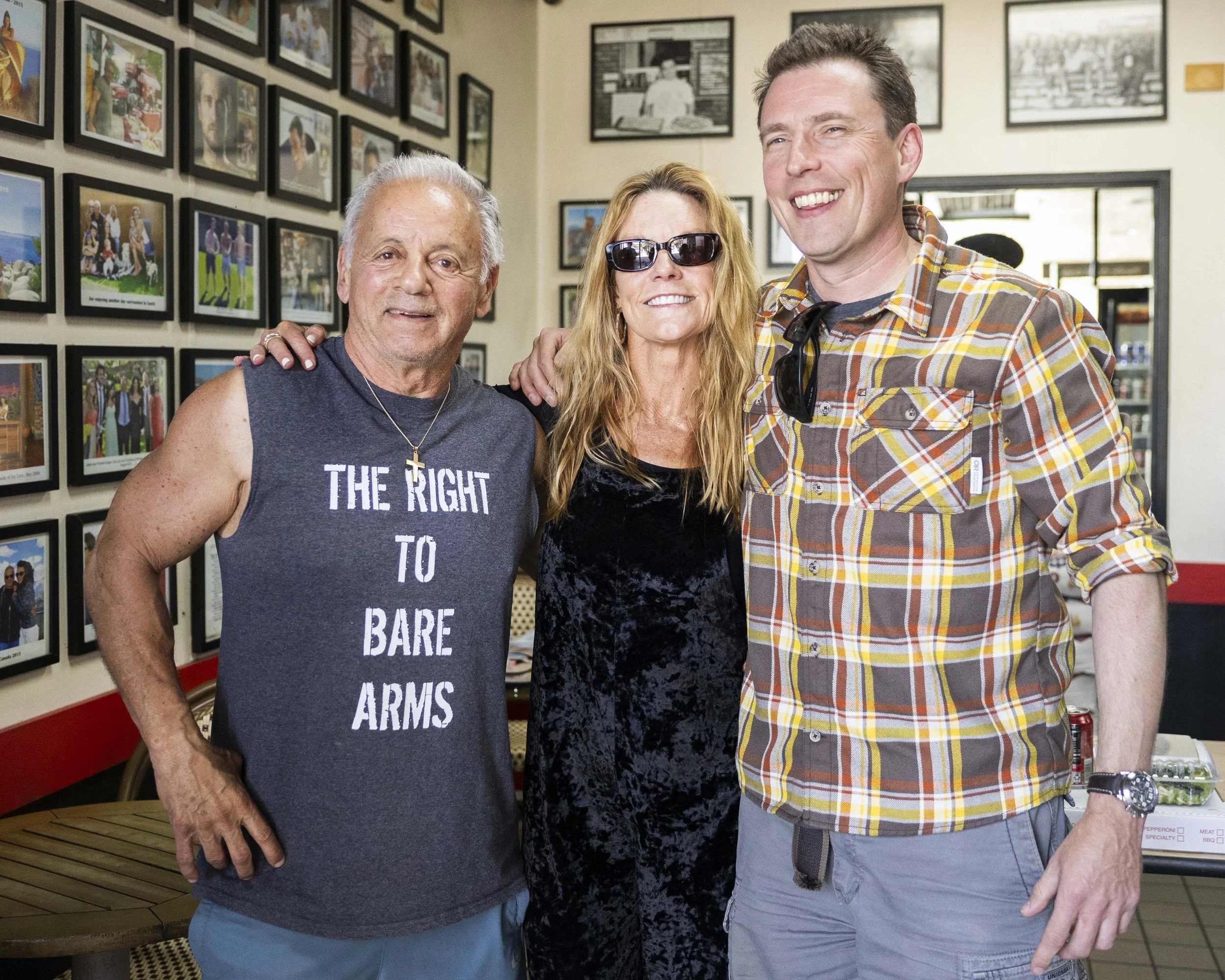 Joe D’Amore and two guests pose at his pizza shop, D’Amores Pizza, in Malibu, Calif., on Friday, April 24, 2026. (Kayjel J. Mairena | The Corsair) 