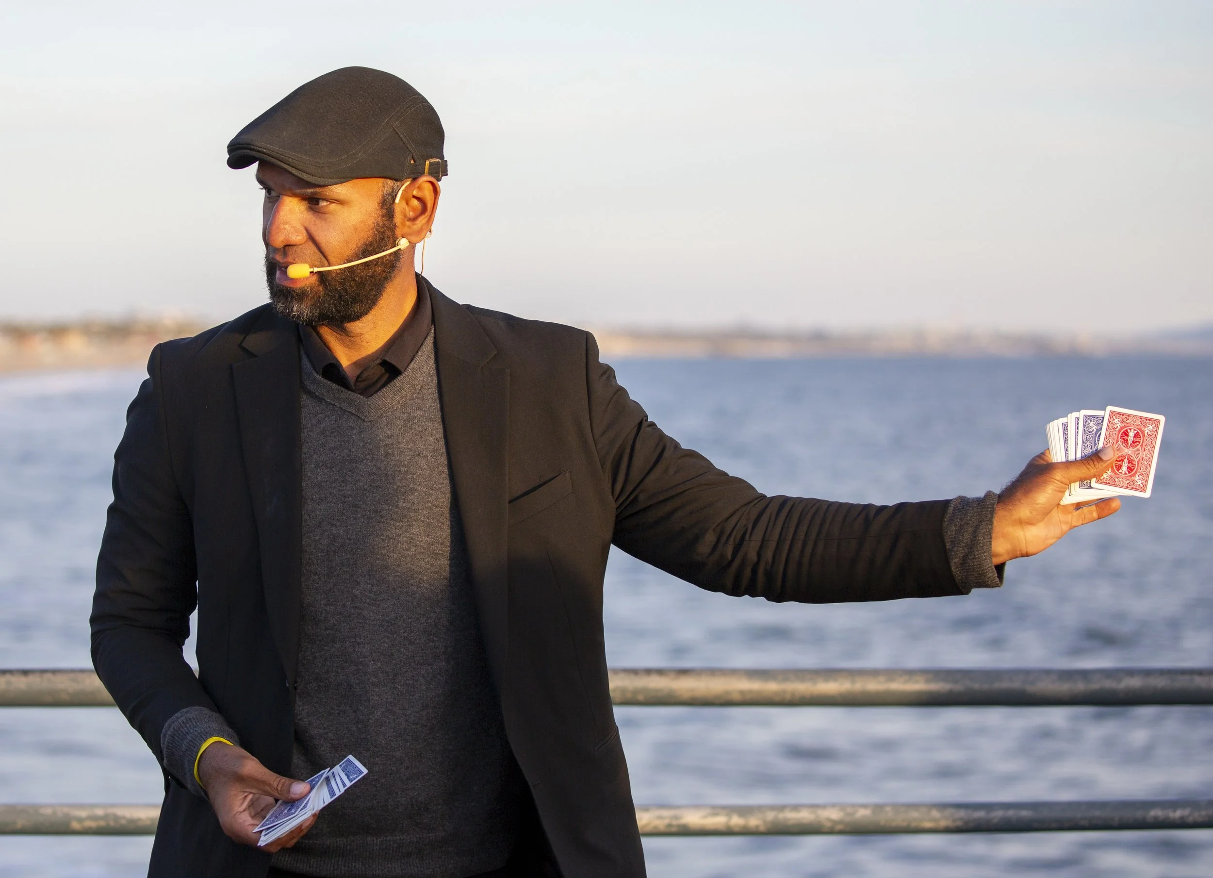  Street magician Ronascherman performs a card trick for visitors at the Santa Monica Pier in Santa Monica, Calif., on Thursday, April 23, 2026. (Jinhao Tian | The Corsair) 