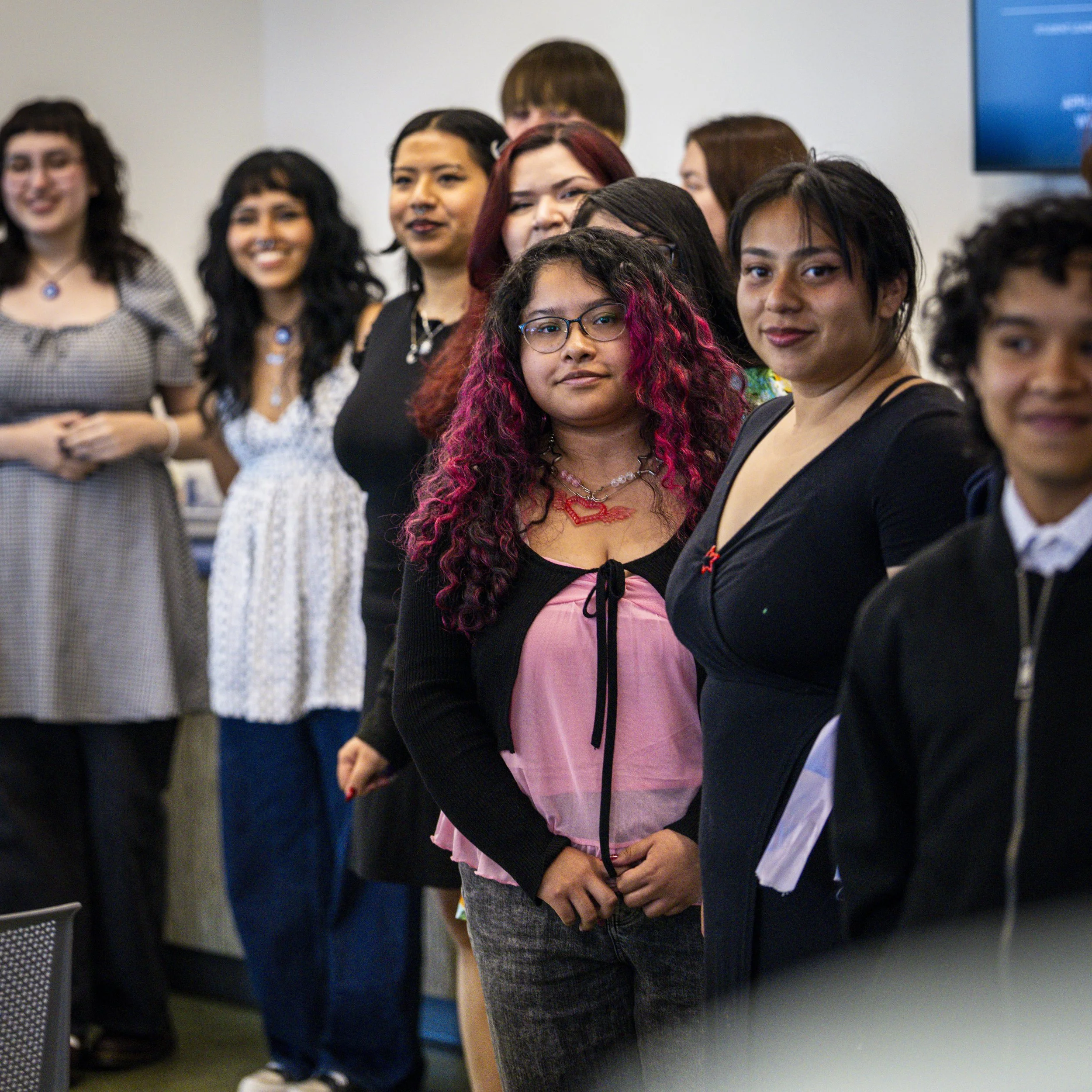  New Santa Monica College (SMC) graduates line up to receive their certificates, caps and stoles during the Student Equity Center celebration for LGBTQIA2S+ graduates from the Class of 2026 on Wednesday, May 27, 2026, in the Student Services Center’s